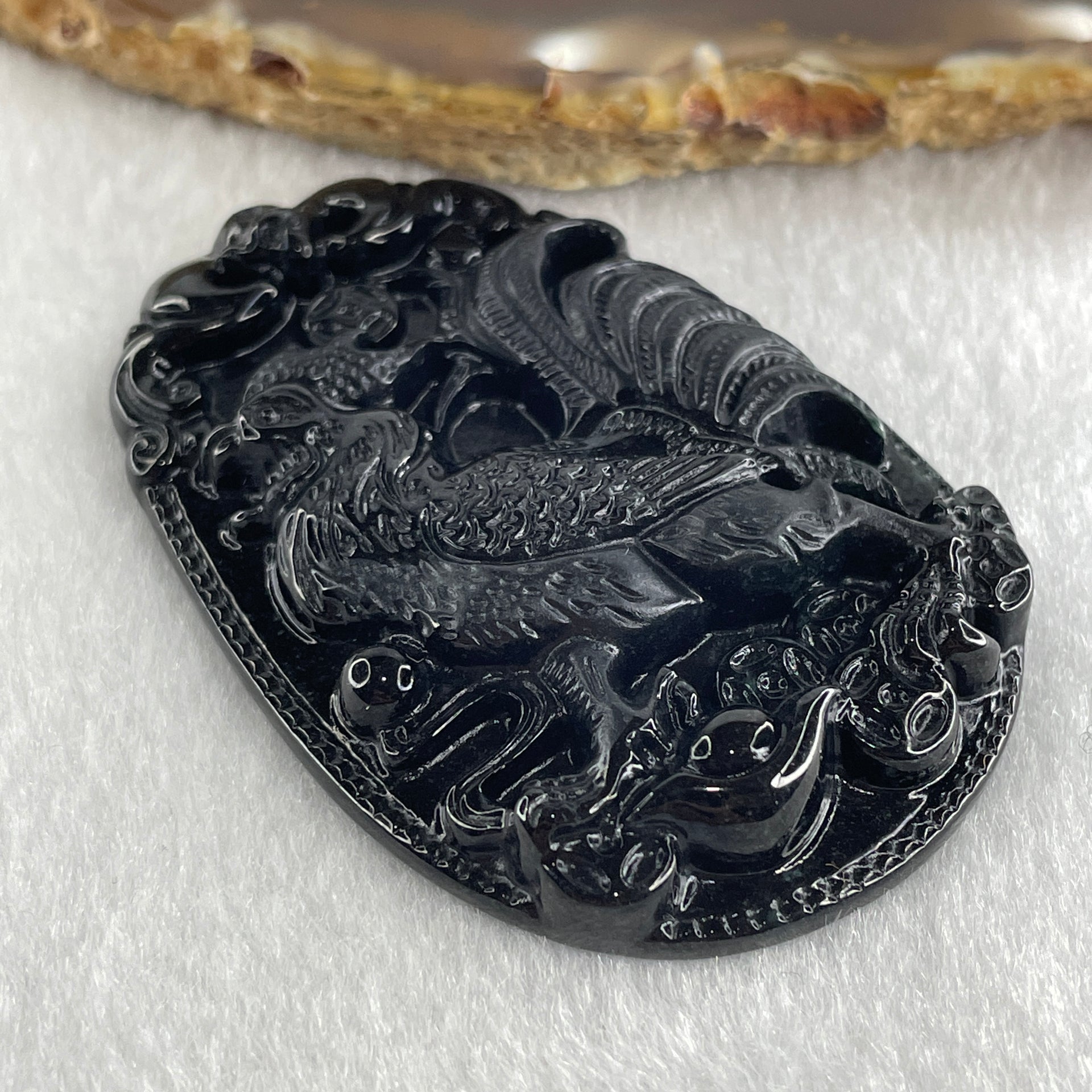 Type A Opaque to Partial Translucent Black Omphacite Jadeite Rooster Pendant 25.65g 59.3 by 40.1 by 8.9mm - Huangs Jadeite and Jewelry Pte Ltd