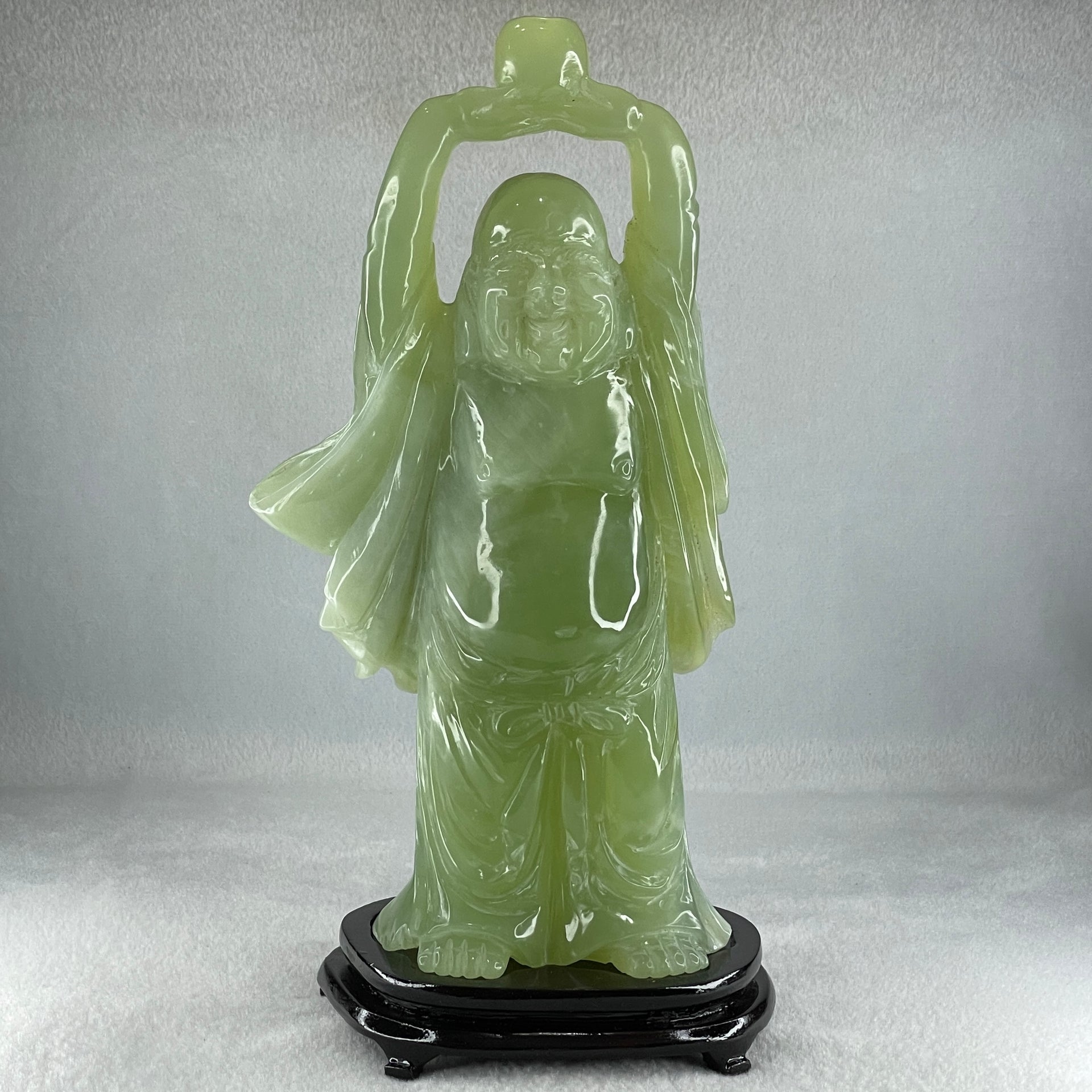Natural Green Serpentine Stand Laughing Milo Buddha with Wealth Pot with Wooden Stand Display 1,599.3g 140.0 by 90.0 by 270.0mm - Huangs Jadeite and Jewelry Pte Ltd