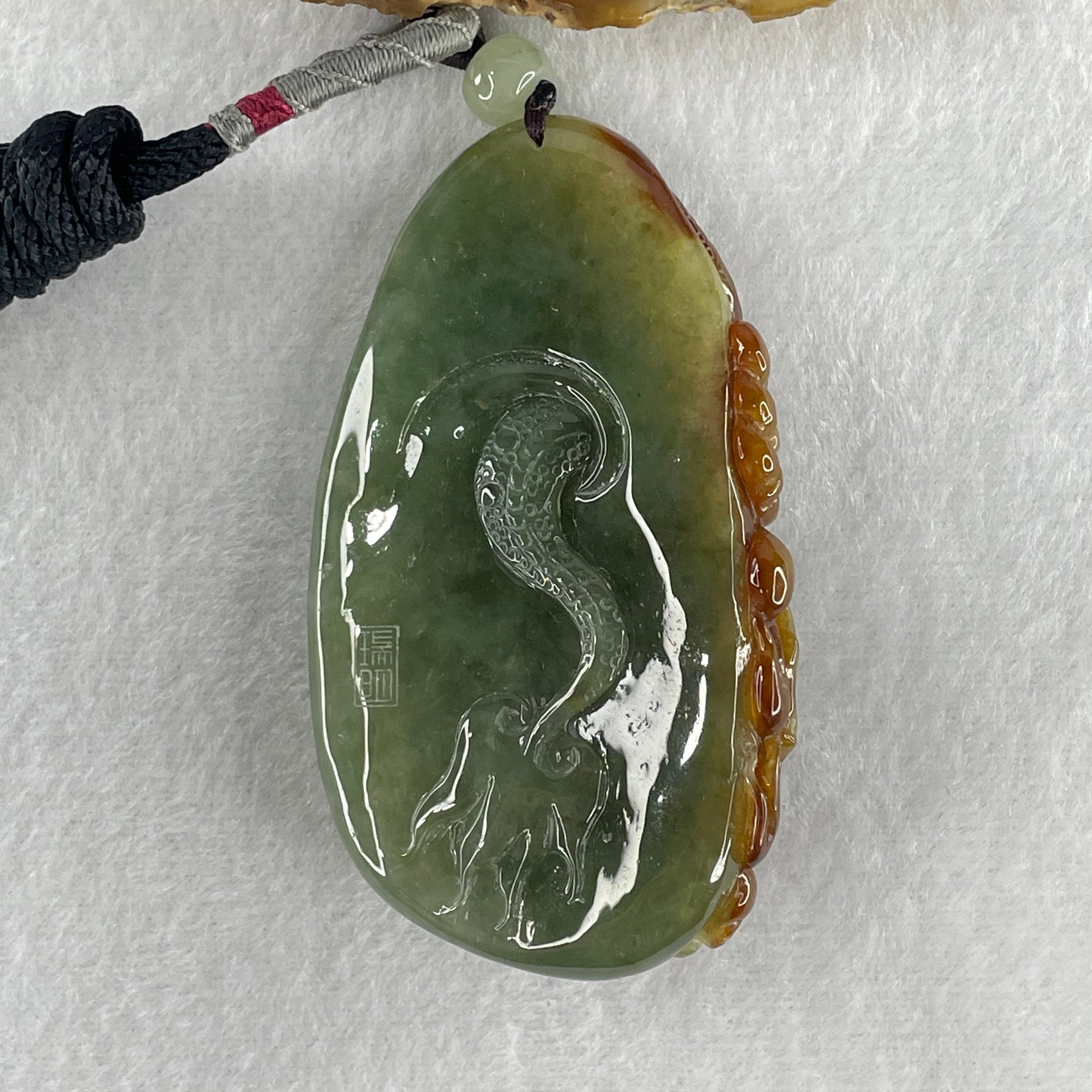 Grand Master Type A Light Green with Yellow Patches Jadeite Dragon Double Side Pendant 100.73g 35.0 by 43.3 by 20.9mm - Huangs Jadeite and Jewelry Pte Ltd