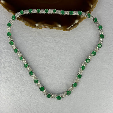 Natural Emeralds (Beryl) 25.0 cts. Total 42.34g including 31 Emeralds, 121 Natural Diamonds in 8k White Gold with NGI Cert No. 82835786 - Huangs Jadeite and Jewelry Pte Ltd