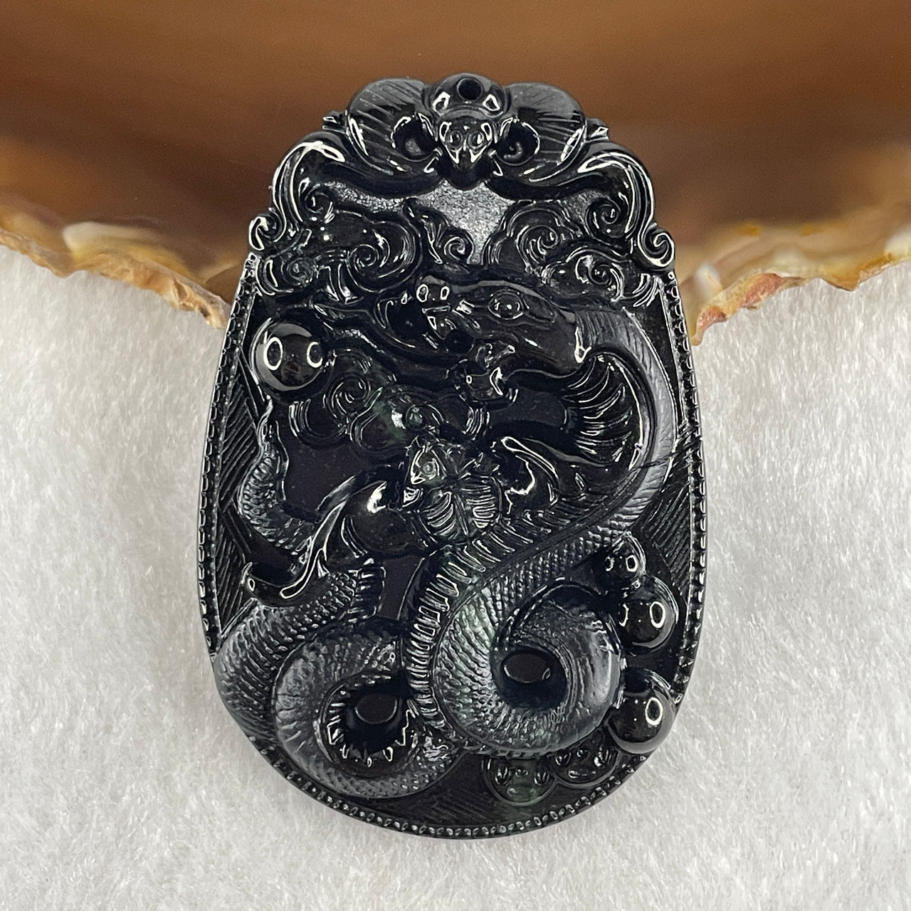 Type A Opaque to Partial Translucent Black Omphacite Jadeite Snake Pendant 24.70g 59.7 by 40.1 by 8.5mm - Huangs Jadeite and Jewelry Pte Ltd