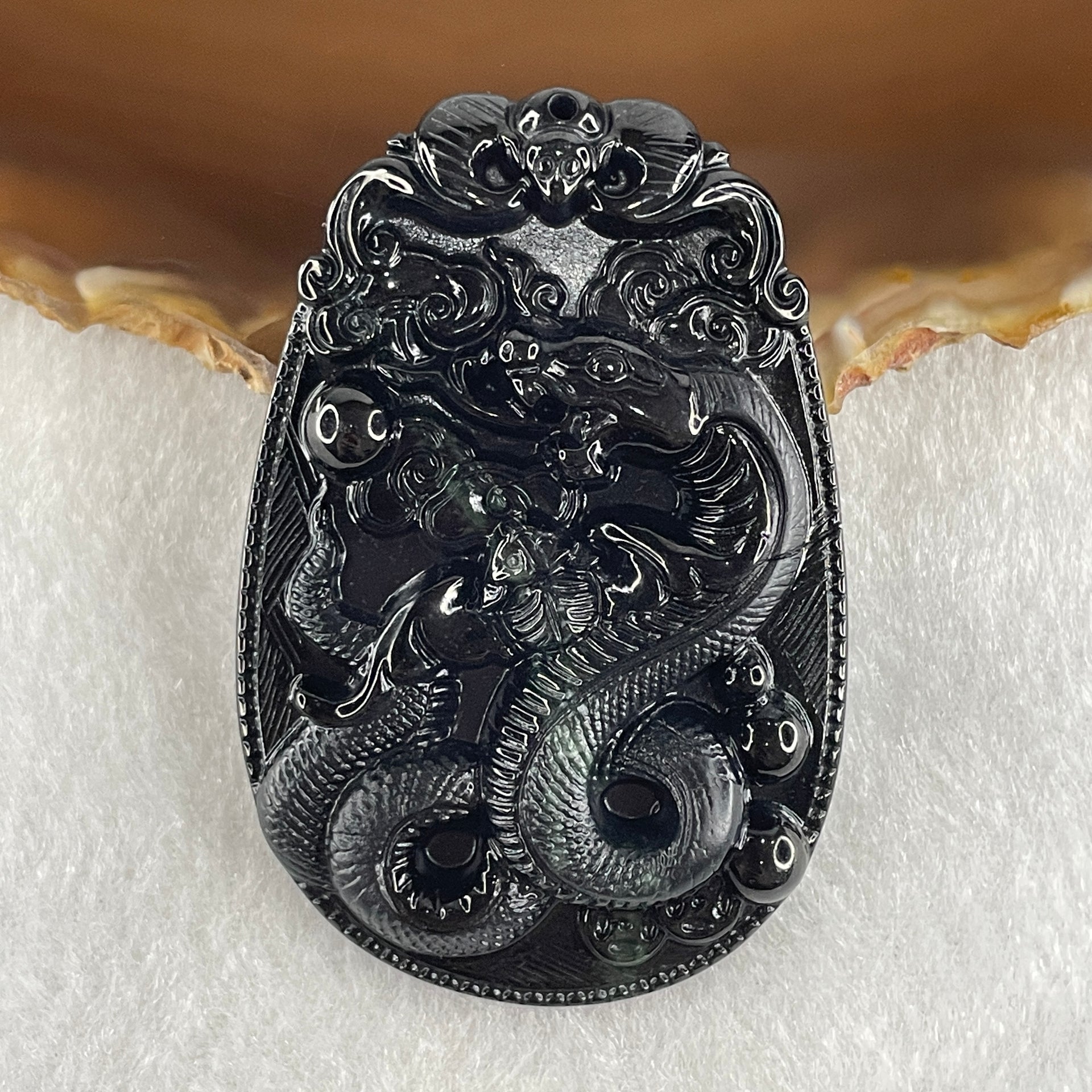 Type A Opaque to Partial Translucent Black Omphacite Jadeite Snake Pendant 24.70g 59.7 by 40.1 by 8.5mm - Huangs Jadeite and Jewelry Pte Ltd