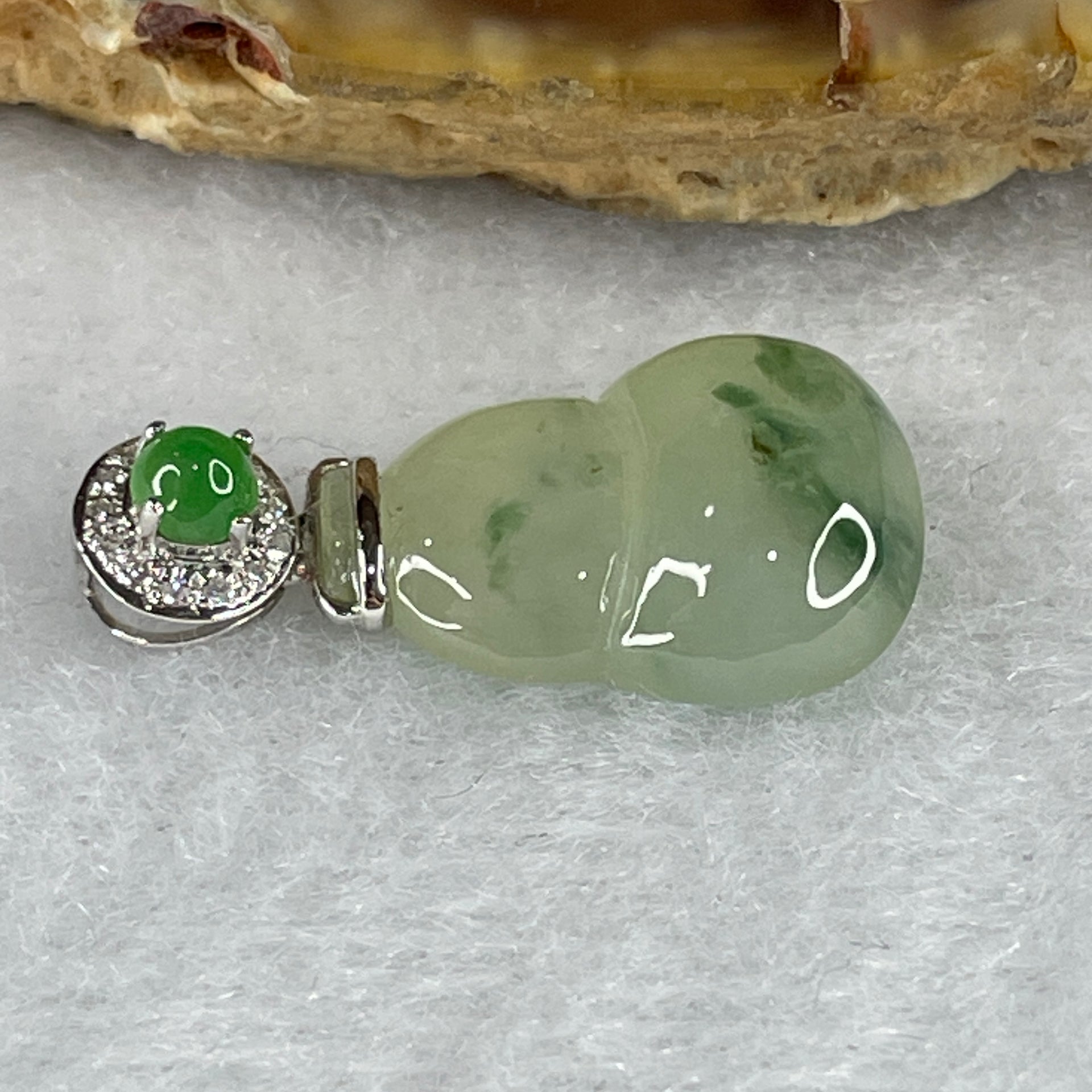 Certified Type A 18k White Gold Icy Green Piao Hua Hulu Jade Jadeite 2.00g 23.9 by 11.7 by 5.1mm - Huangs Jadeite and Jewelry Pte Ltd