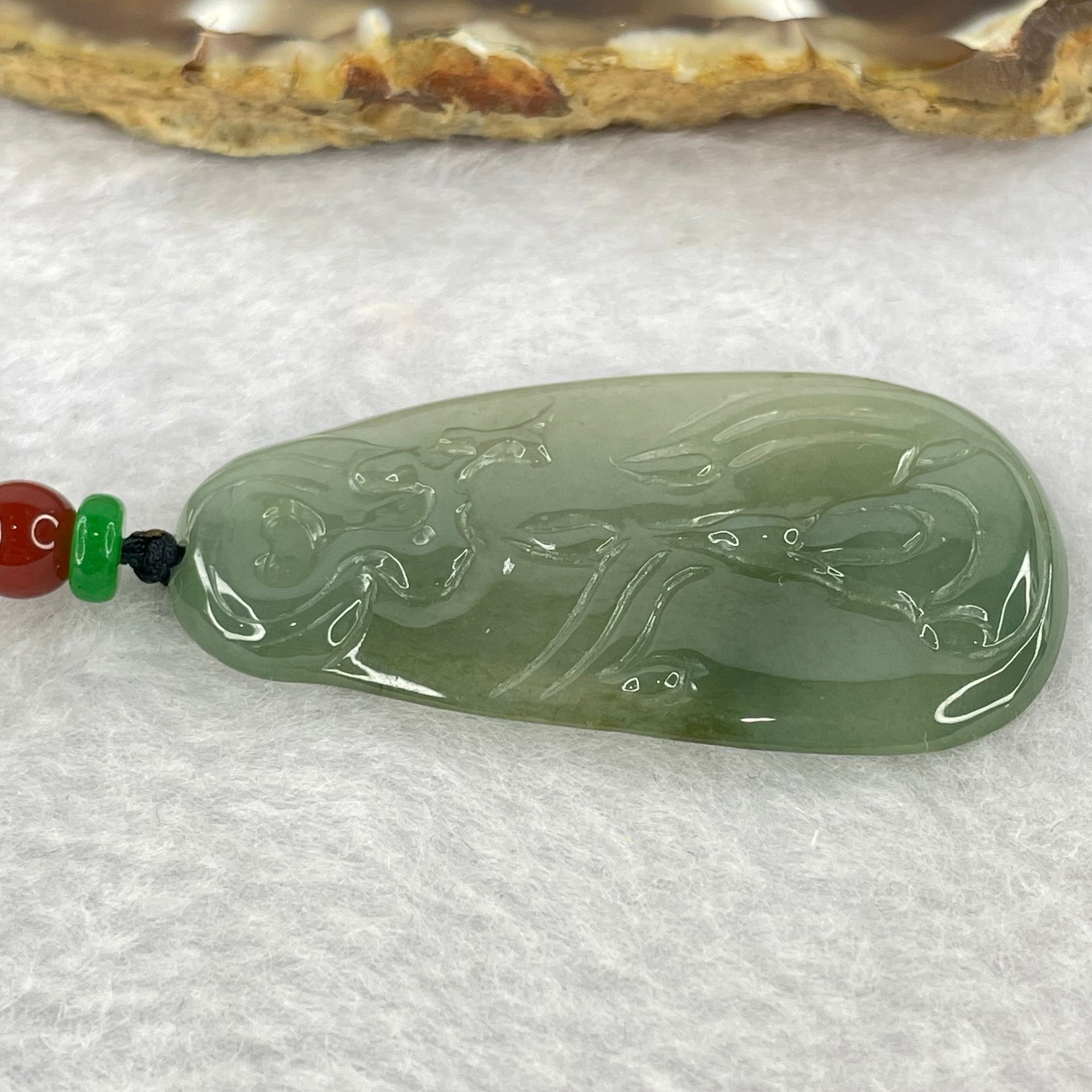 Type A Blueish Green Jadeite Benefactor Pendent 12.10g 48.0 by 26.0 by 4.2mm - Huangs Jadeite and Jewelry Pte Ltd