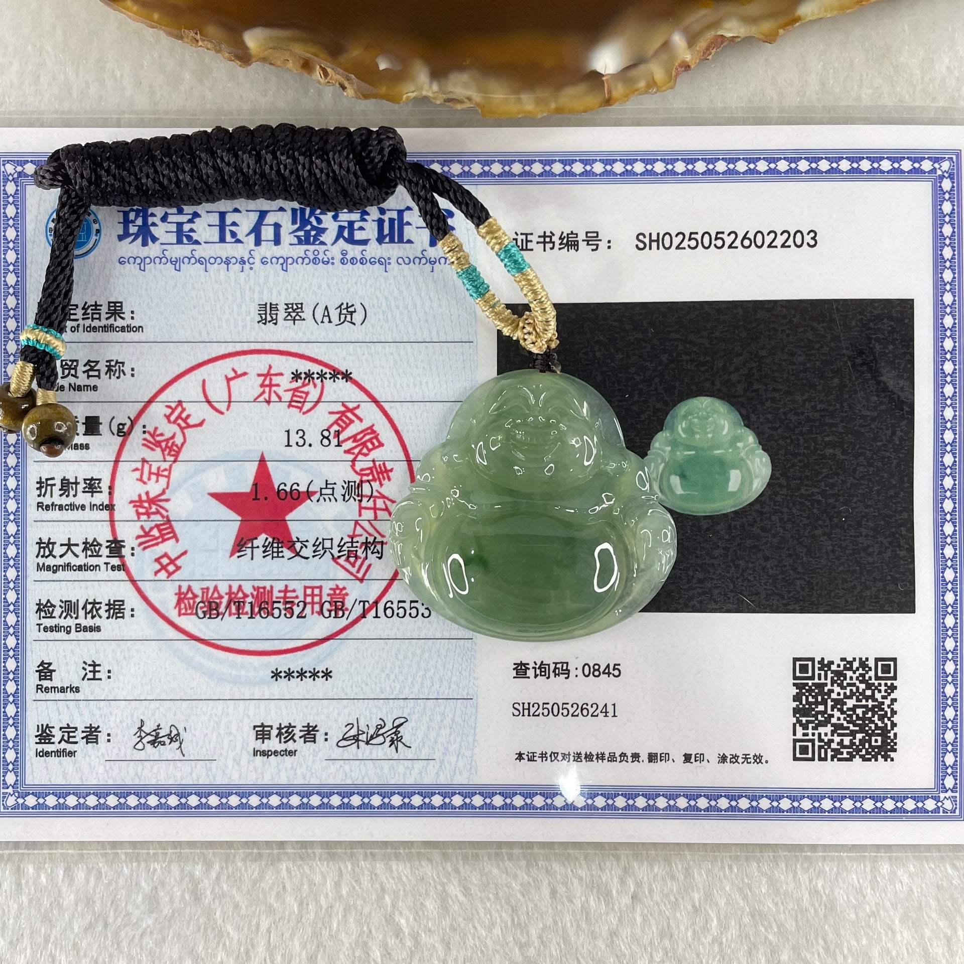 Type A Icy Green with Blueish Green Piao Hua Floral Jadeite Milo Buddha Pendant 13.81g 33.8 by 36.3 by 6.5mm - Huangs Jadeite and Jewelry Pte Ltd