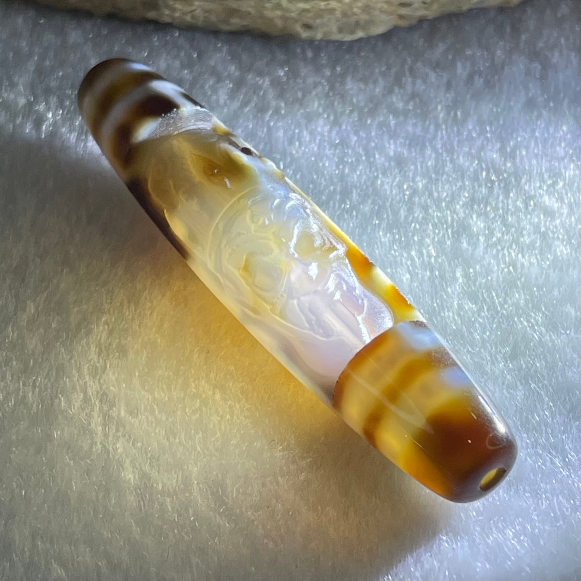 Natural Powerful Tibetan Old Oily Agate Zha Ji La Mu Female Cai Shen Carvings on 9 Eyes Dzi Bead Heavenly Master (Tian Zhu) 九眼扎基拉姆女财神天珠 11.04g 57.9 by 12.0mm - Huangs Jadeite and Jewelry Pte Ltd