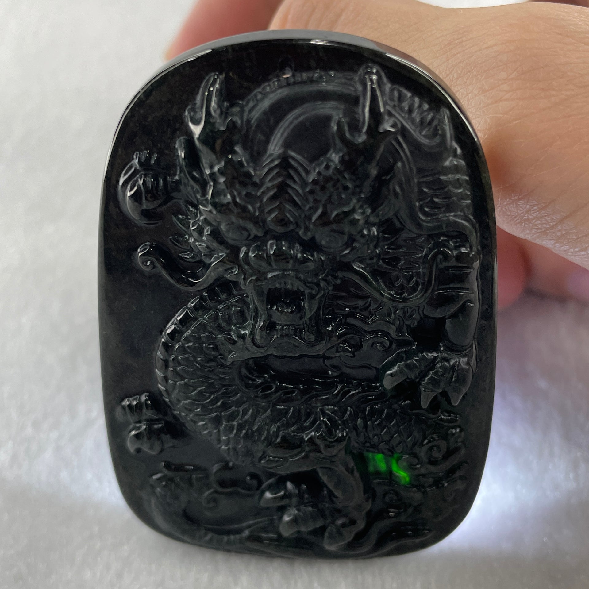 Type A Opaque to Partial Translucent Black Omphacite Jadeite Dragon Pendant 34.19g 66.8 by 45.5 by 9.4mm - Huangs Jadeite and Jewelry Pte Ltd