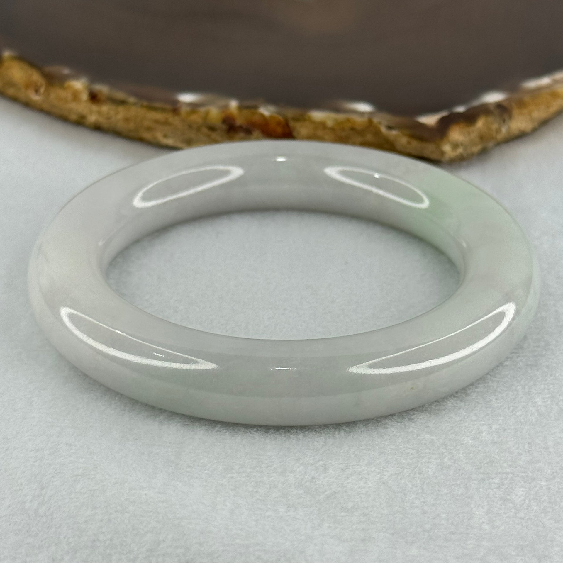 Type A Translucent Faint Blueish Green with Faint Lavender Jadeite Bangle Internal Diameter 56.79mm 437.29cts 87.85g 12.0 by 13.0mm With NGI Cert 32886087 (Close to Perfect) - Huangs Jadeite and Jewelry Pte Ltd