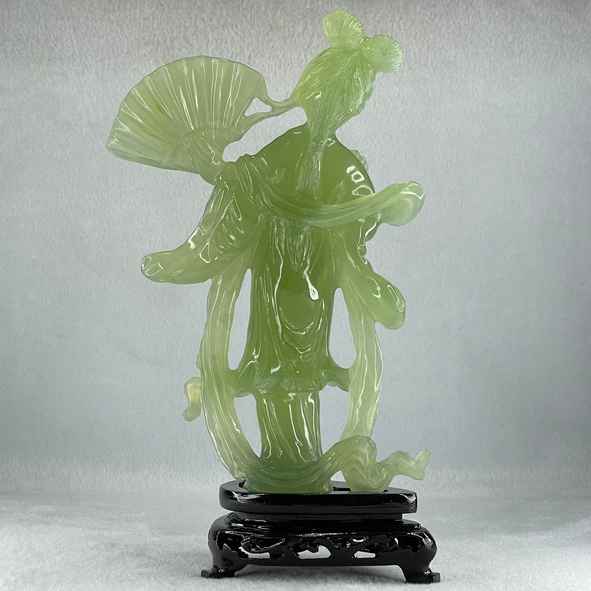 Natural Green Serpentine Fairy with Fan and Flower with Wooden Stand Display 476.2g 130.0 by 70.0 by 225.0mm - Huangs Jadeite and Jewelry Pte Ltd