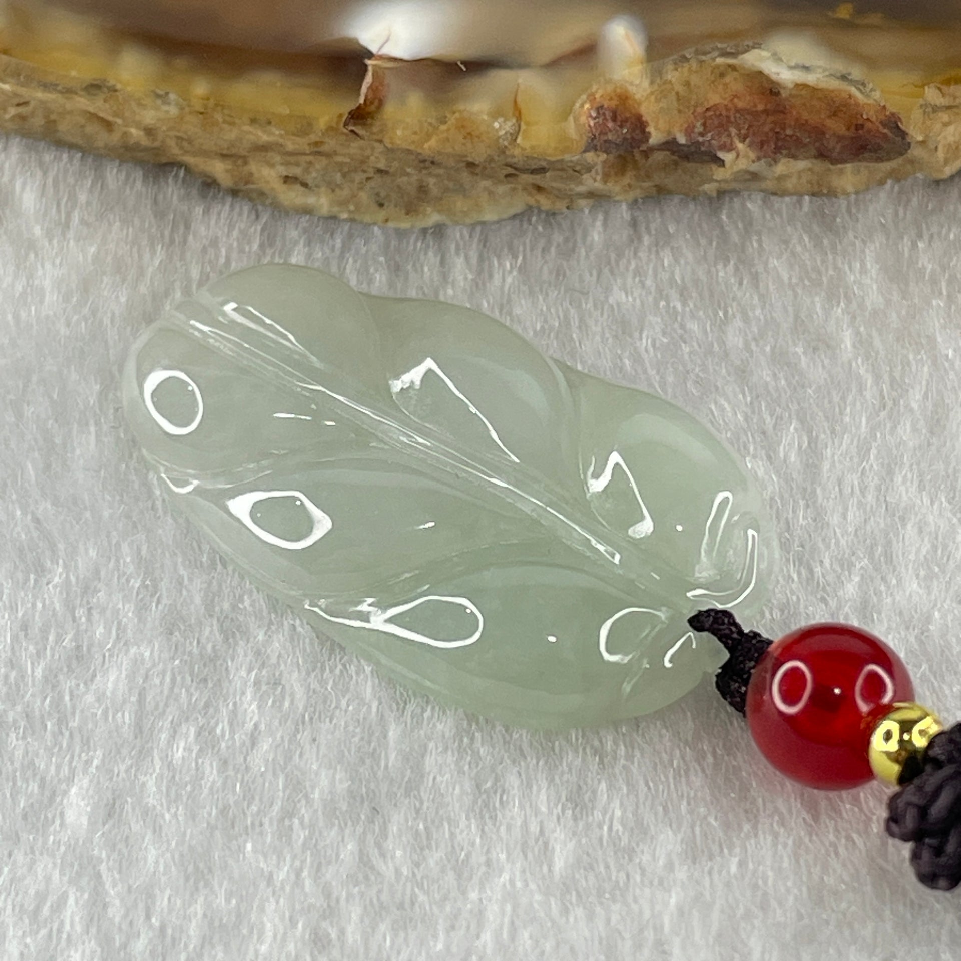 Natural Type A Faint Green Jadeite Leaf Pendant 4.77g 24.8 by 16.4 by 4.0mm - Huangs Jadeite and Jewelry Pte Ltd