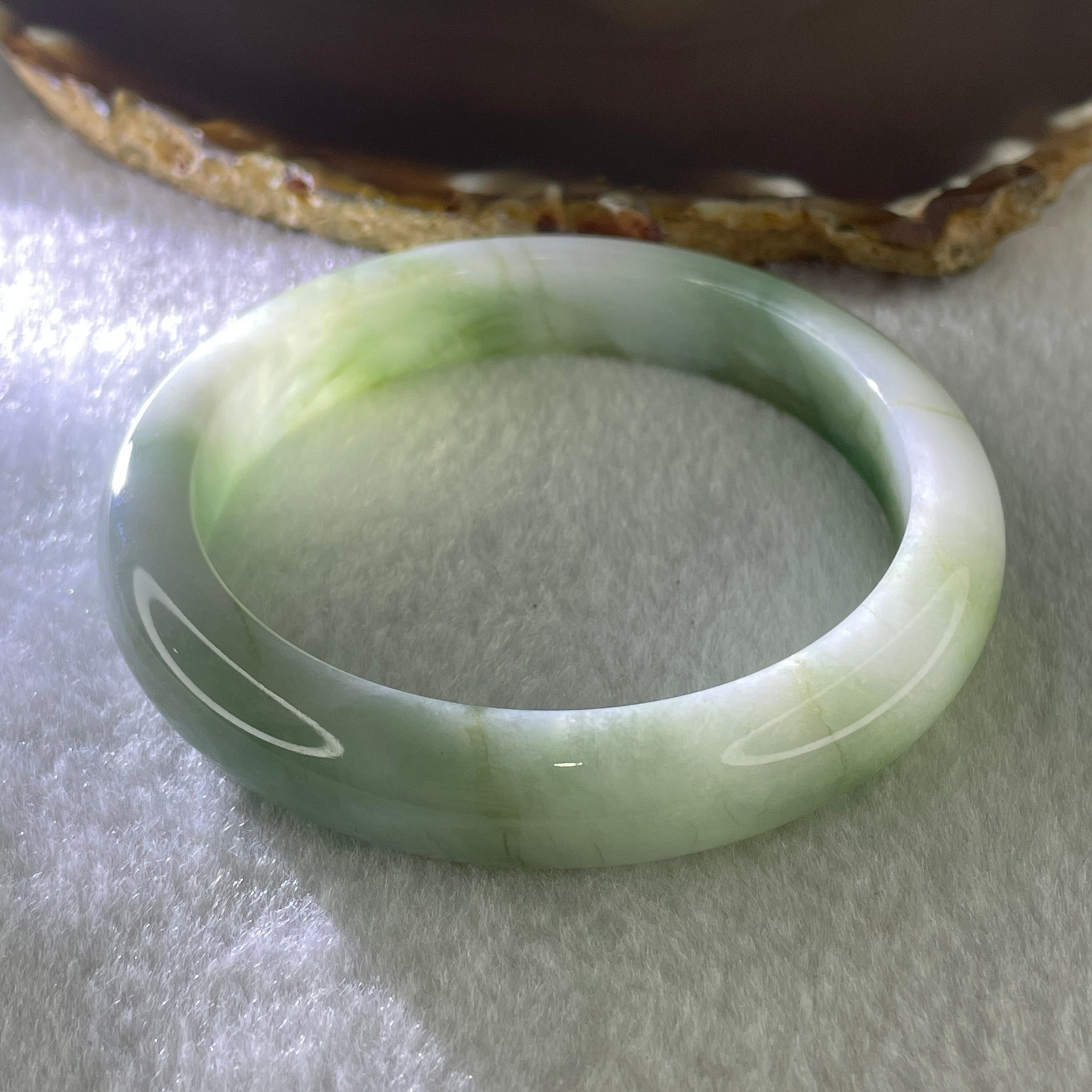 Natural Type A Jelly Light Green with Blueish Green Piao Hua Flora Jadeite Bangle 60.75g Inner Diameter 60.8mm 12.3 by 9.4mm (Very Very Slight Internal Lines) - Huangs Jadeite and Jewelry Pte Ltd