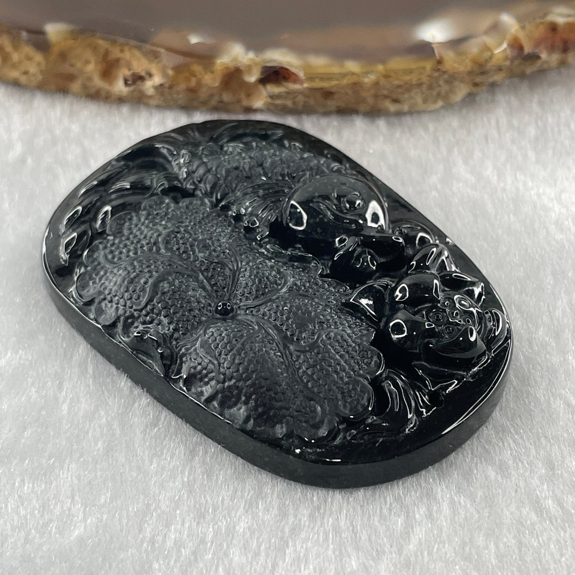 Type A Opaque to Partial Translucent Black Omphacite Jadeite Fish with Lotus Flower and Leaf Pendant 24.60g 51.1 by 35.9 by 8.8mm - Huangs Jadeite and Jewelry Pte Ltd