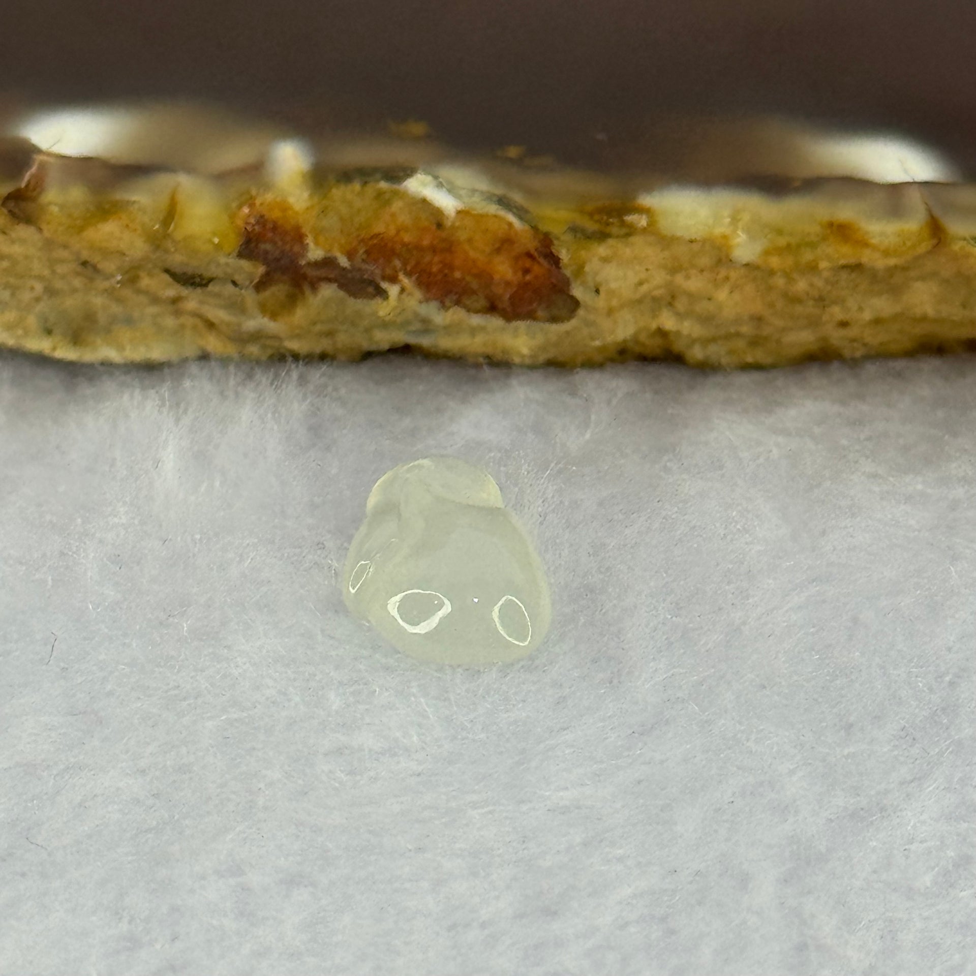 Type A Icy Faint Green Jadeite Rabbit Charm 0.55g 12.1 by 3.4 by 7.8mm - Huangs Jadeite and Jewelry Pte Ltd