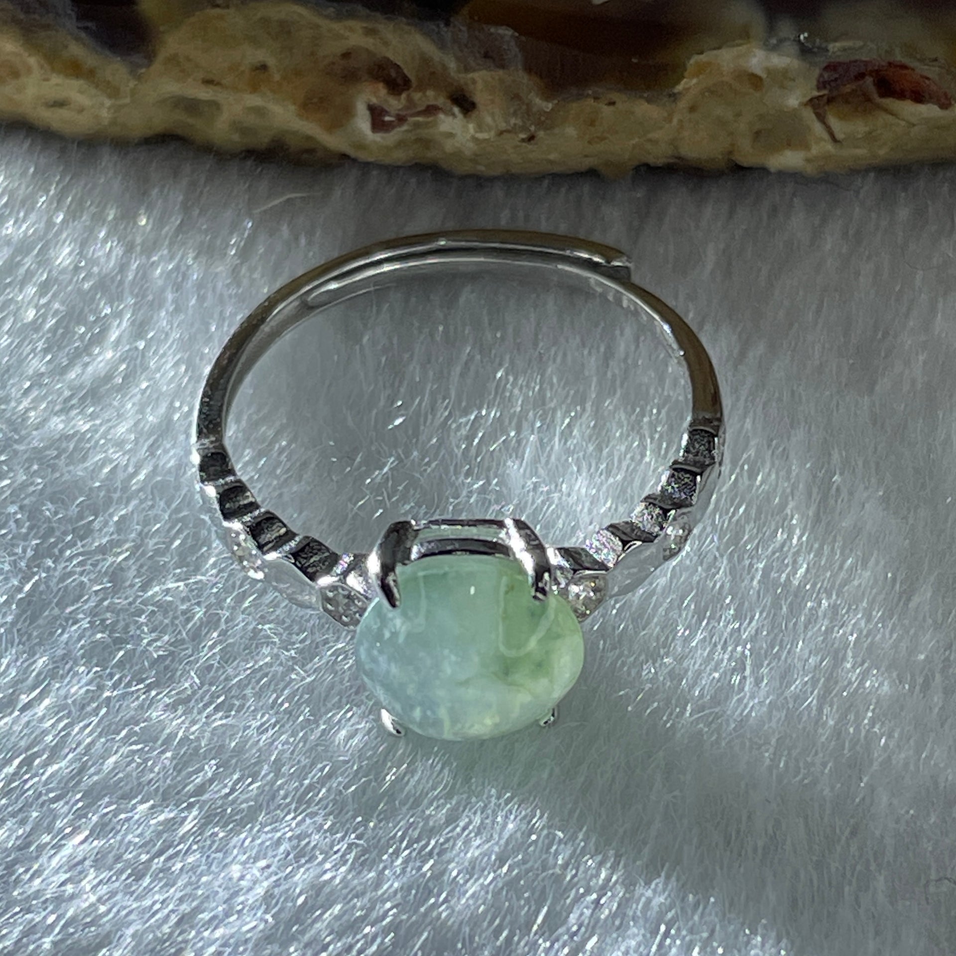 Natural Type A Semi Icy Faint Green Jadeite Round Shape Cabouchon with Cubic Zirconia in S925 Silver Ring (Adjustable Size) 1.44g 7.9 by 4.5mm - Huangs Jadeite and Jewelry Pte Ltd