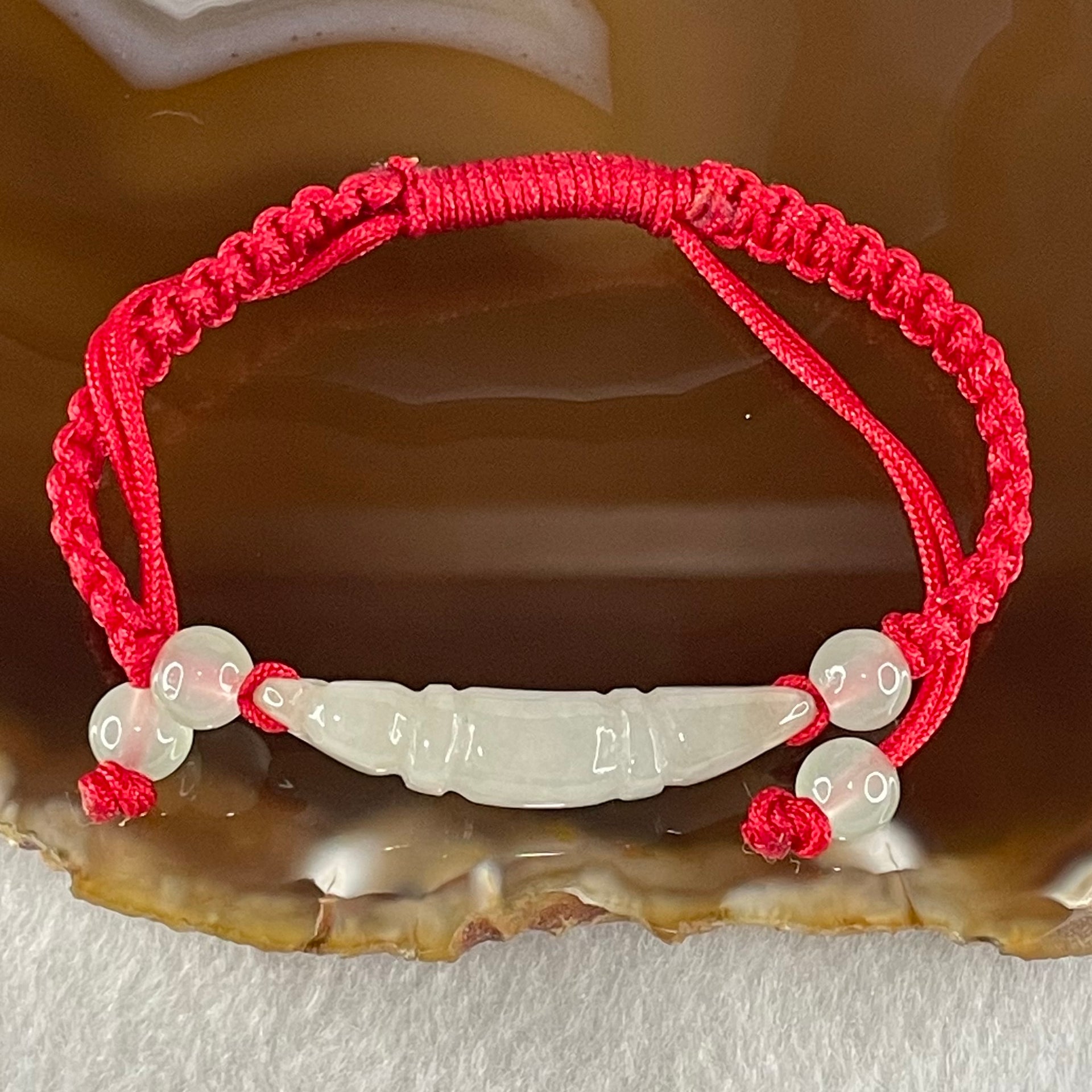 Type A Light Green Jadeite Scholarship Brush in Red String Bracelet 5.57g 6.7 by 7.5 by 33.5mm - Huangs Jadeite and Jewelry Pte Ltd