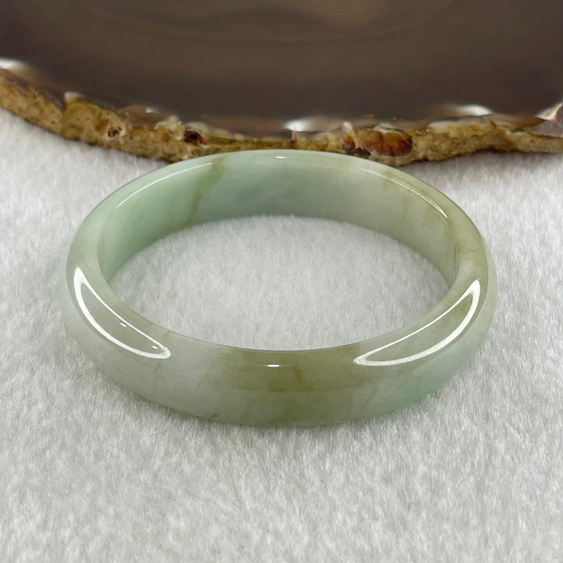 Natural Type A Light Green Faint Lavender Jadeite Oval Bangle 37.26g Inner Diameter 53.8mm 12.2 by 7.0mm (Slight Internal Lines) - Huangs Jadeite and Jewelry Pte Ltd