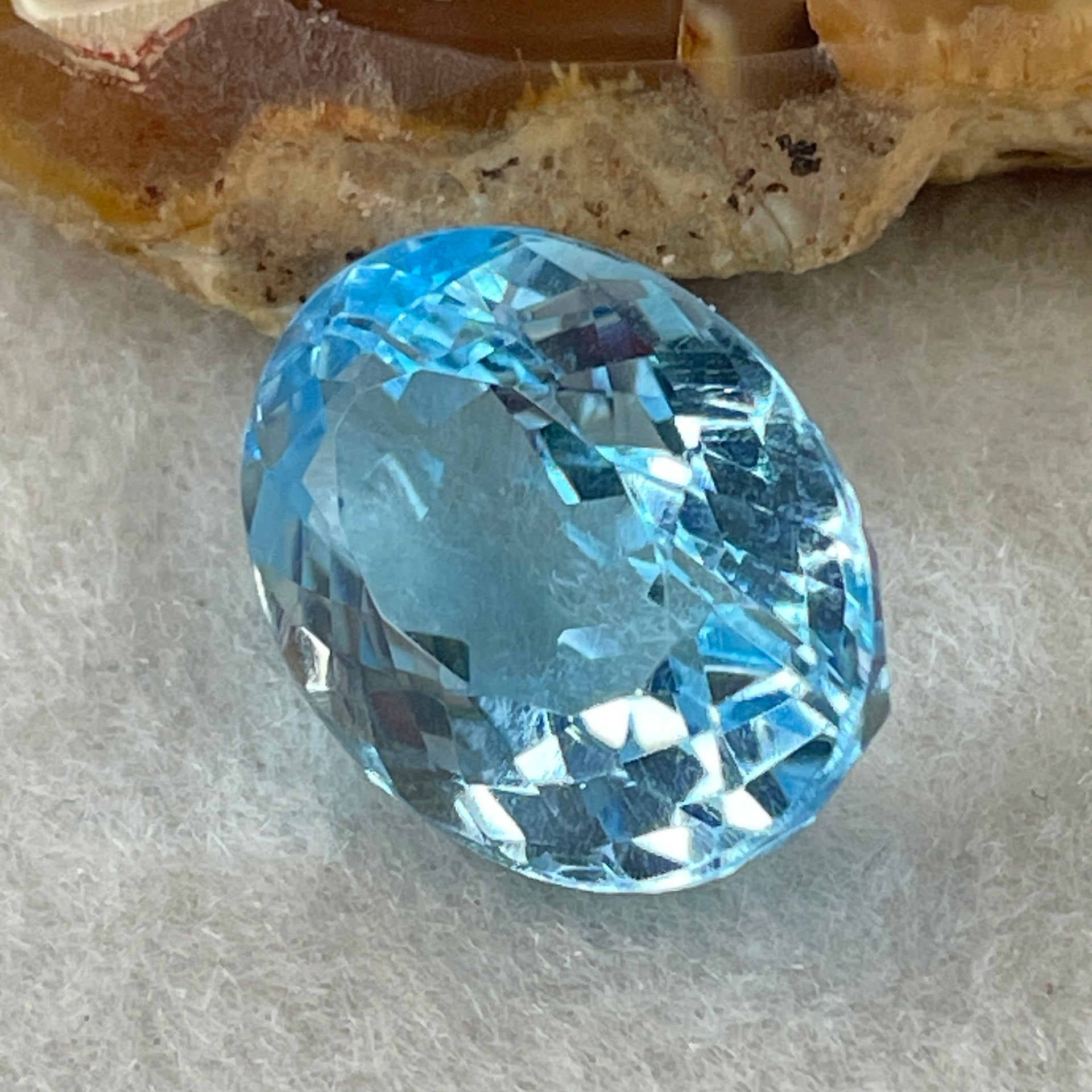 Natural Sky Blue Topaz Oval Shape 15.57ct 17.1 by 12.4 by 8.6mm - Huangs Jadeite and Jewelry Pte Ltd