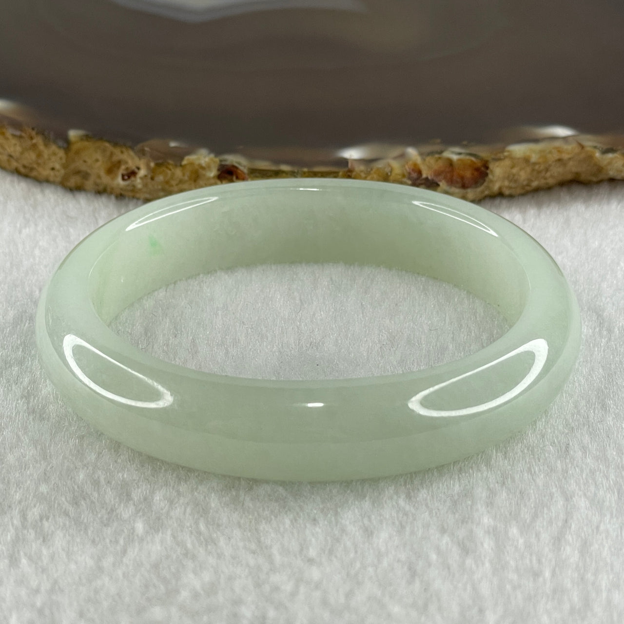 Type A Natural Jelly Light Green Jadeite Oval Bangle 47.17g Inner Diameter 54.6mm 12.3 by 8.2mm (Internal Line) - Huangs Jadeite and Jewelry Pte Ltd