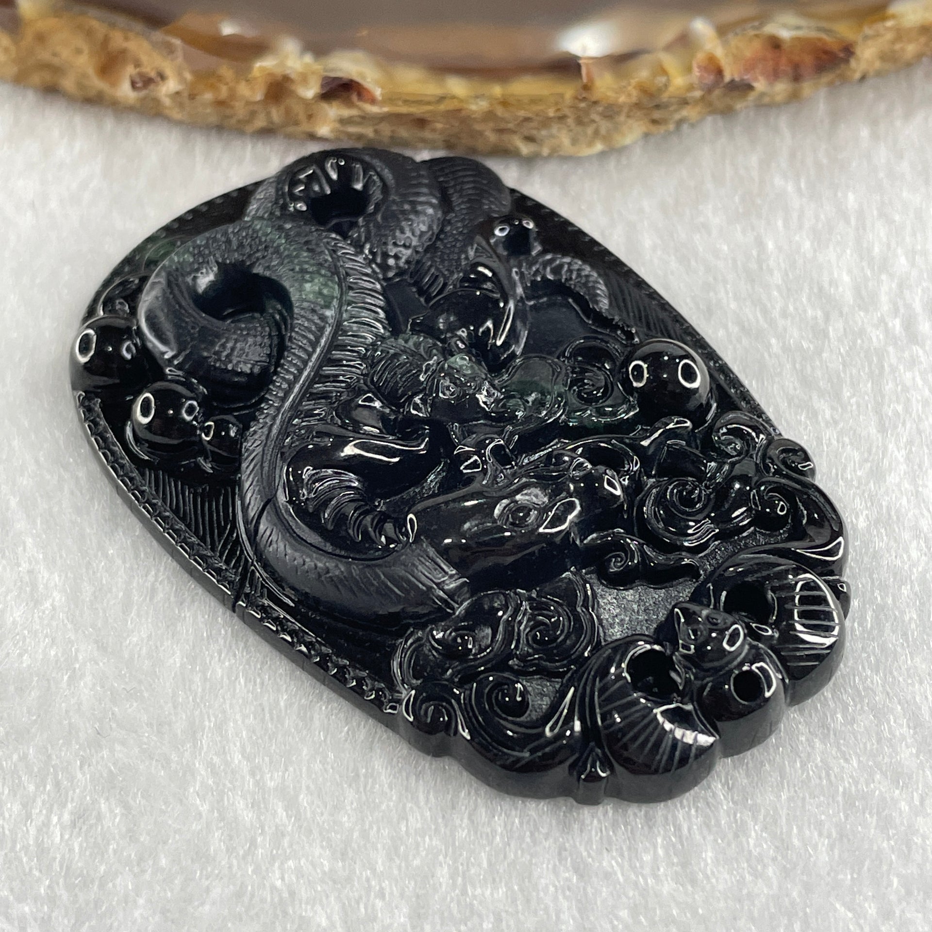 Type A Opaque to Partial Translucent Black Omphacite Jadeite Snake Pendant 24.70g 59.7 by 40.1 by 8.5mm - Huangs Jadeite and Jewelry Pte Ltd
