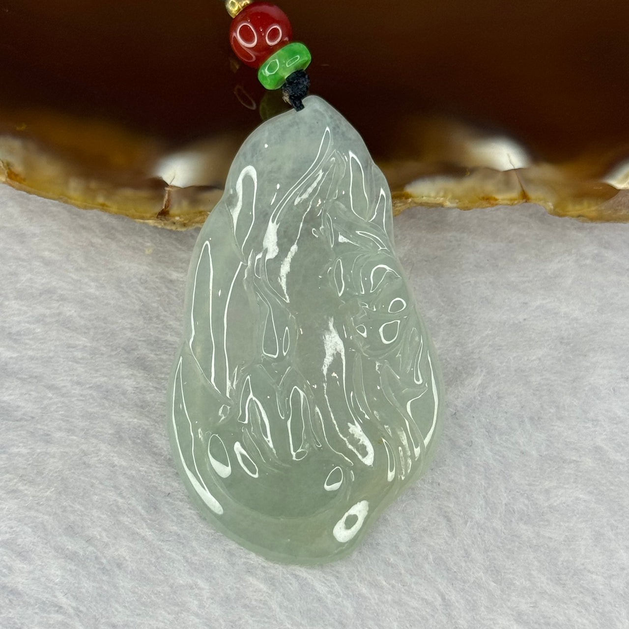 Type A Semi ICY Light Green Jadeite Benefactor with Lotus Flower Pendent 12.08g 46.4 by 27.6 by 4.8mm - Huangs Jadeite and Jewelry Pte Ltd