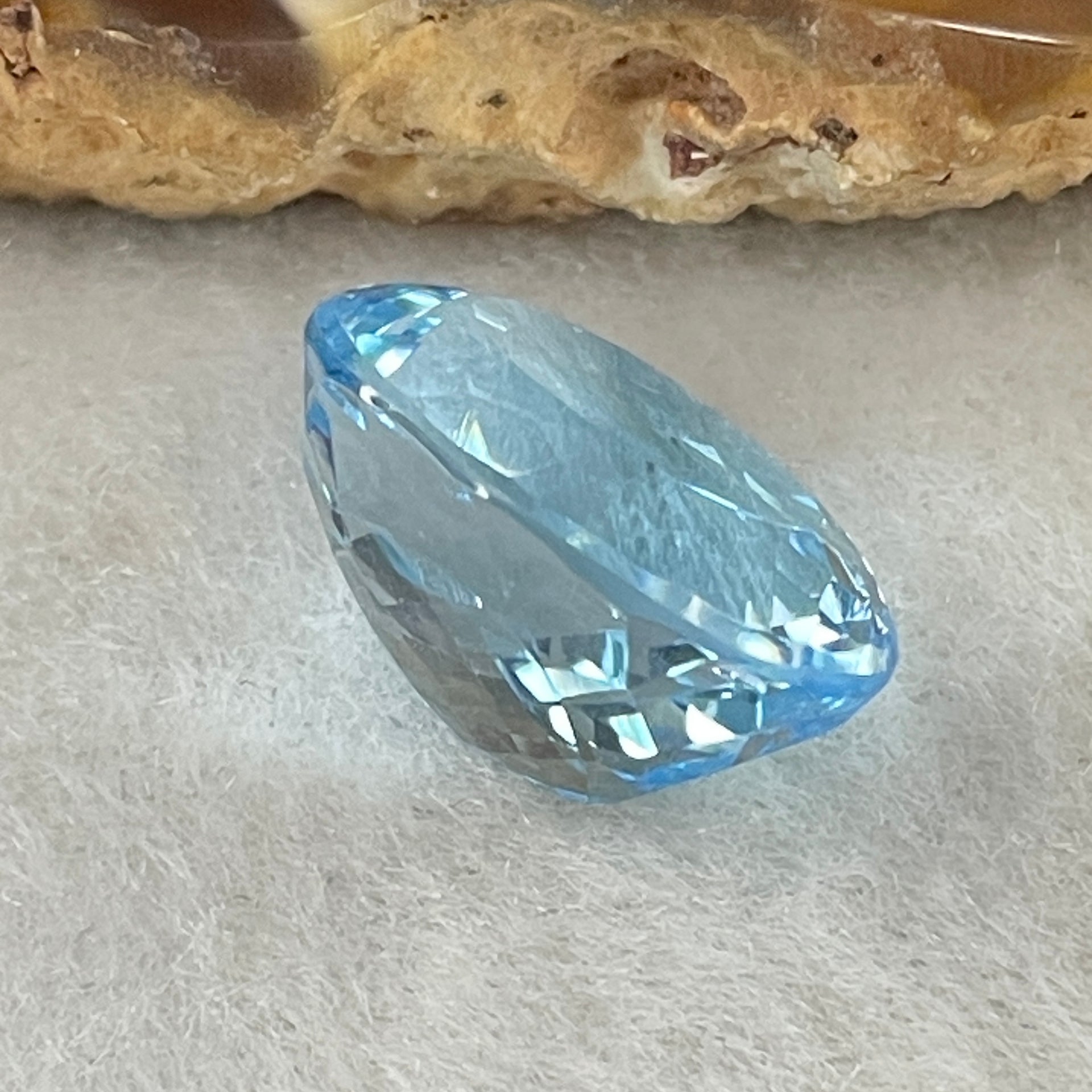 Natural Sky Blue Topaz Oval Shape 13.46ct 14.9 by 12.2 by 8.7mm - Huangs Jadeite and Jewelry Pte Ltd