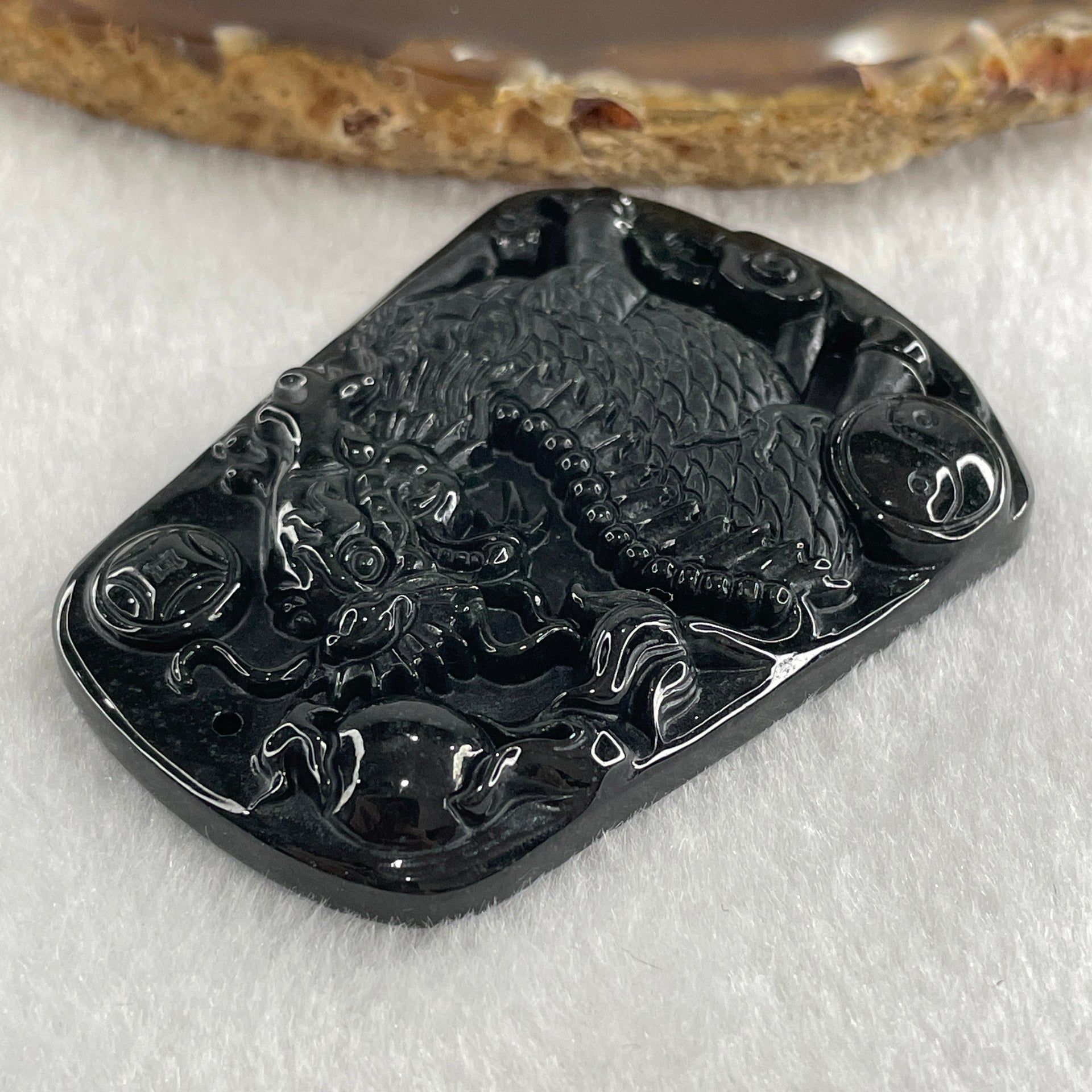 Type A Opaque to Partial Translucent Black Omphacite Jadeite Kirin Qilin Pendant 30.64g 55.7 by 43.5 by 8.5mm - Huangs Jadeite and Jewelry Pte Ltd