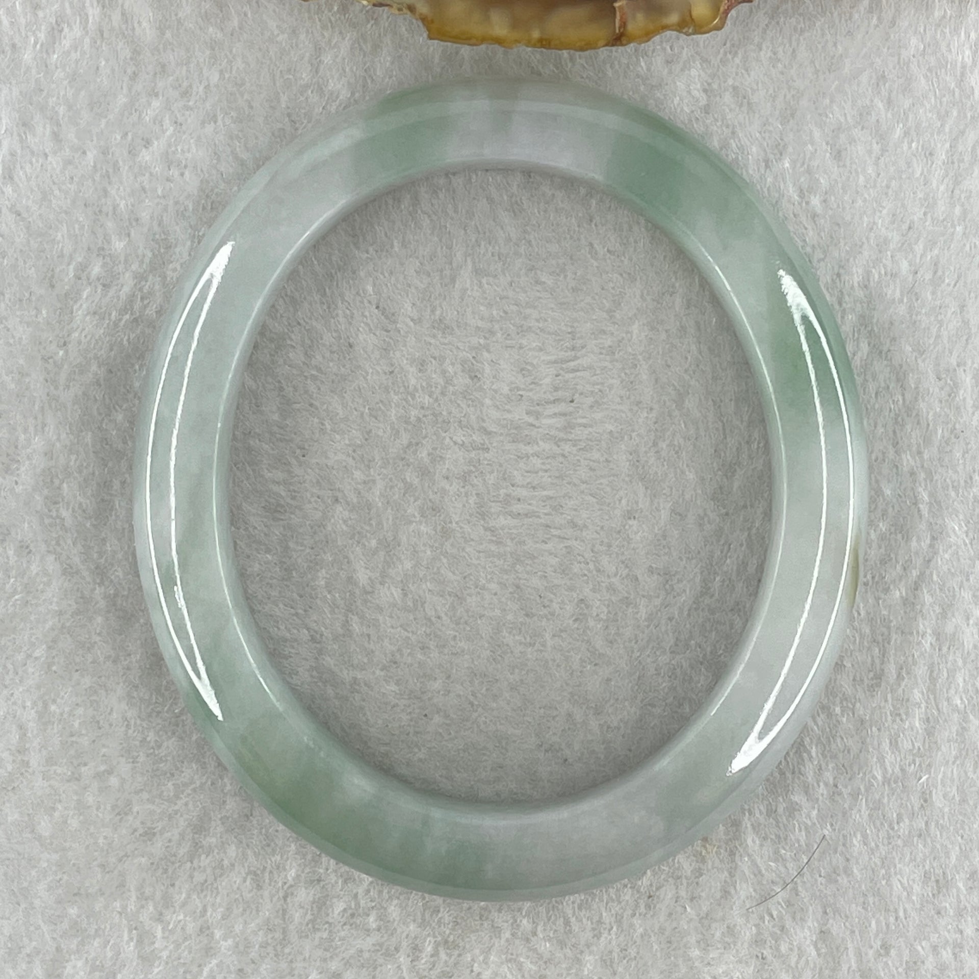 Type A Natural Light Green Jadeite Oval Bangle 34.44g Inner Diameter 52.2mm 9.2 by 8.0mm (Internal Lines) - Huangs Jadeite and Jewelry Pte Ltd