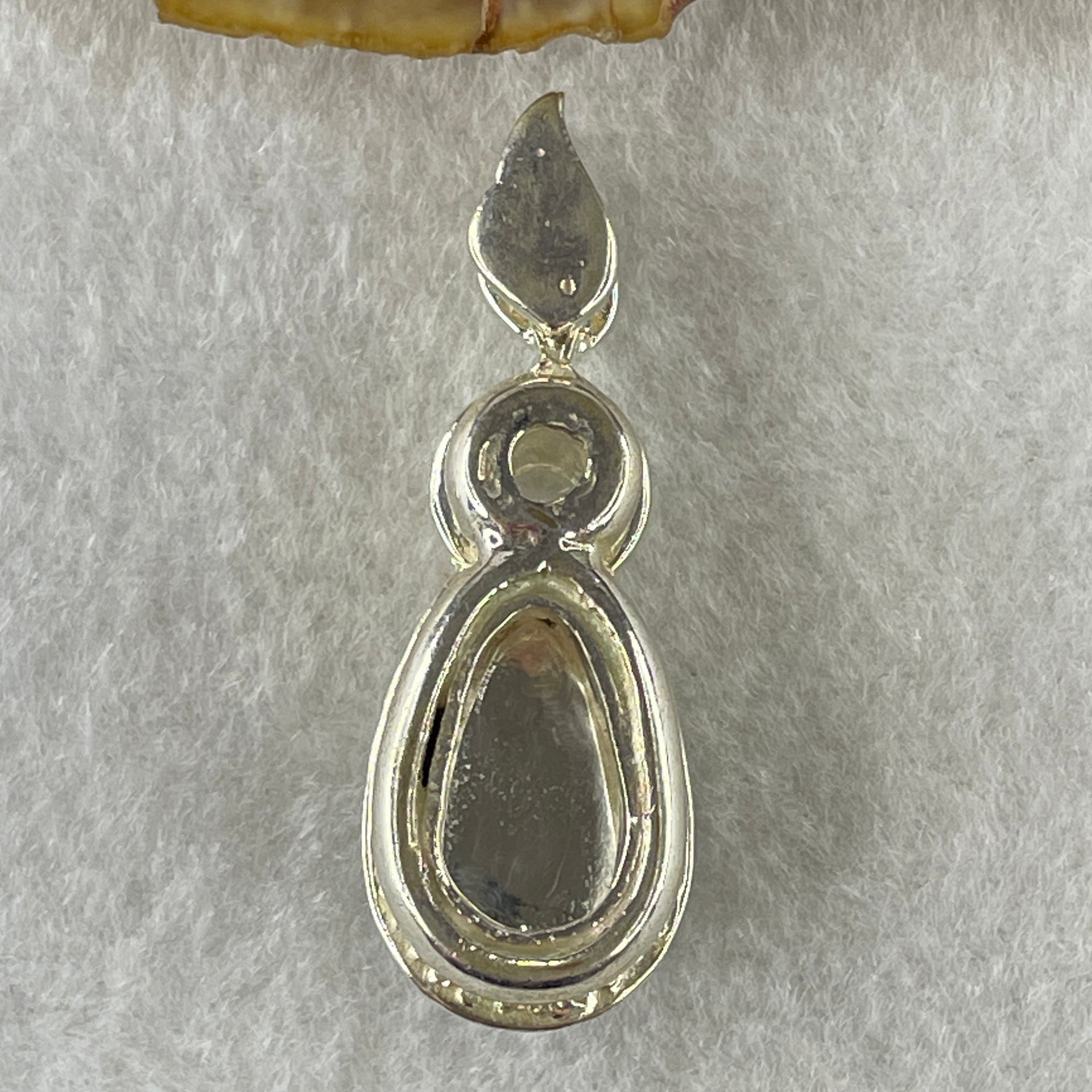 Type A Natural Semi Icy Bright Green Jadeite Tear Drop Shape Stone for Setting 18.1 by 10.5 by 3.0mm (On Silver Pendant Mold) 15.22g - Huangs Jadeite and Jewelry Pte Ltd