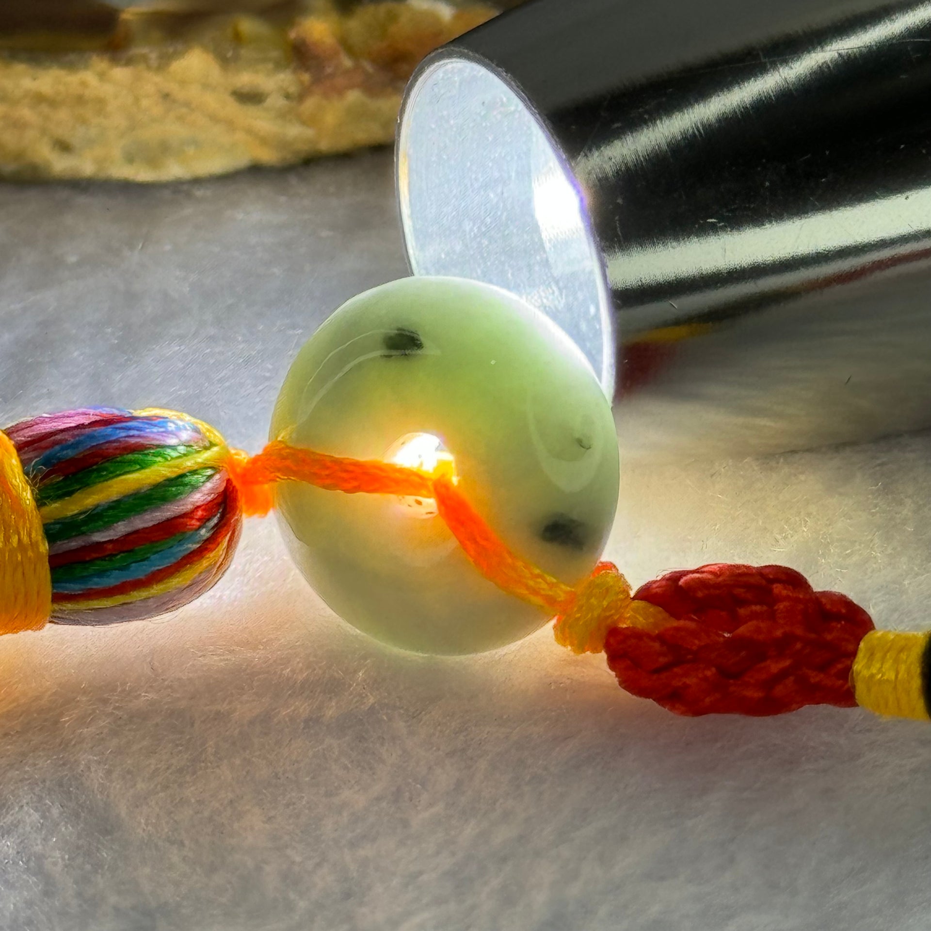 Type A Light Green Lavender Jadeite Ping An Kou Donut Charm Display 8.12g 16.6 by 6.6mm - Huangs Jadeite and Jewelry Pte Ltd