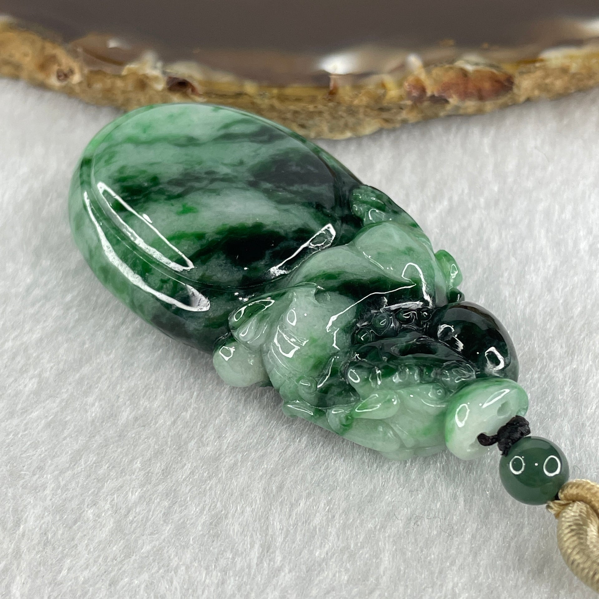 Certified Natural Type A Light Green with Dark Green and Old Mine Spicy Green Pattern Jadeite Pixiu on Money Bag Pendant 46.46g 57.2 by 29.1 by 14.1mm - Huangs Jadeite and Jewelry Pte Ltd
