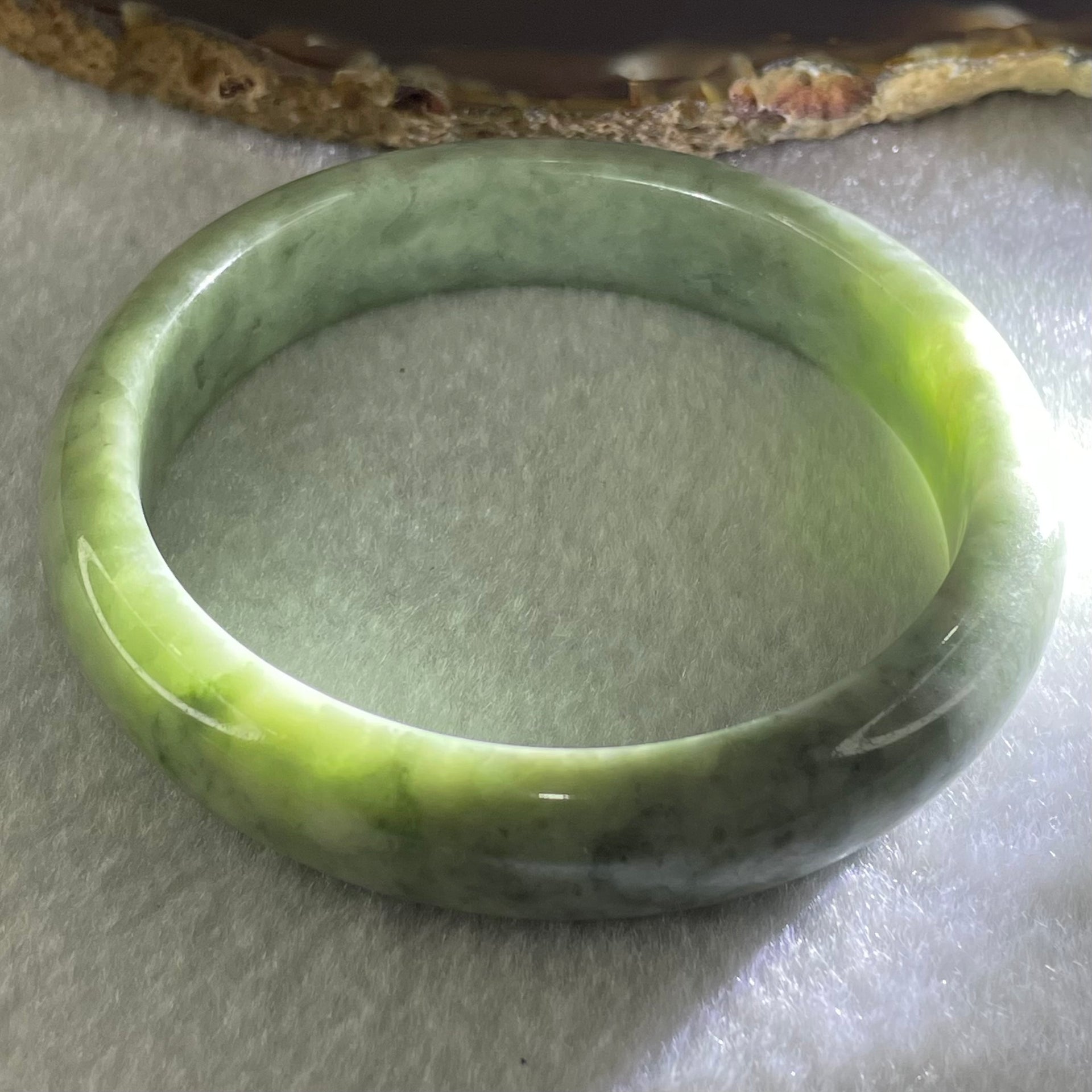 Type A Green Dou Qing Jadeite Bangle 48.94g Internal Diameter 57.7mm 12.6 by 8.4mm (Very Slight External Roughs and Very Slight Internal Lines) - Huangs Jadeite and Jewelry Pte Ltd