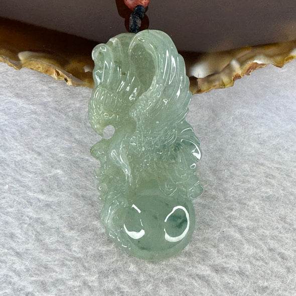 Type A Semi Icy Light Green with Blueish Green and Yellow Piao Hua Jadeite Eagle Pendent 25.83g 52.2 by 25.0 by 9.7 mm - Huangs Jadeite and Jewelry Pte Ltd