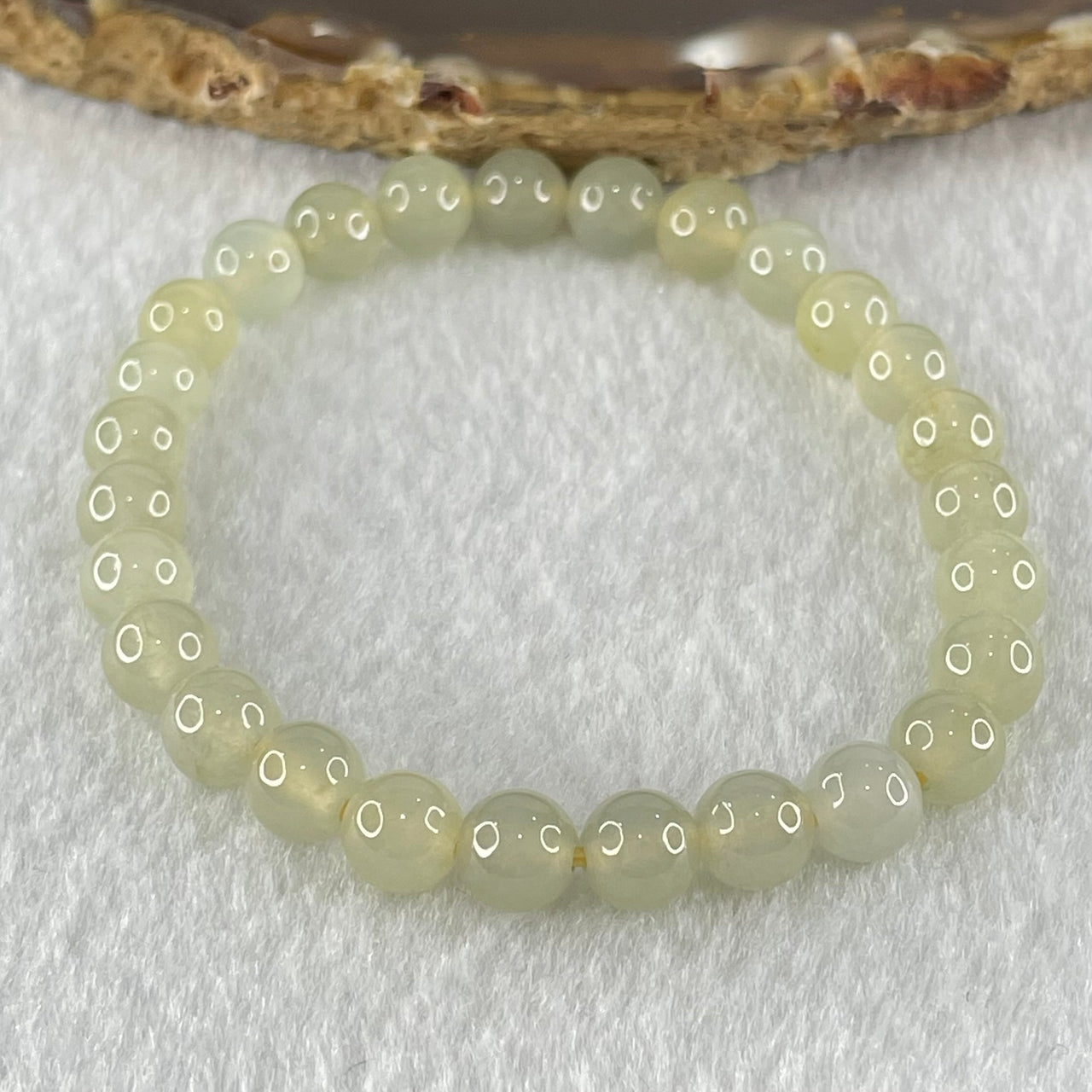 Type A Semi Icy Light Yellowish Blueish Green Jadeite Beads Bracelet 13.73g 14.5cm 6.8mm 27 Beads - Huangs Jadeite and Jewelry Pte Ltd