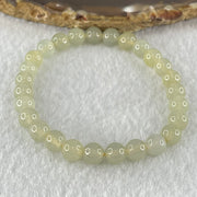 Type A Semi Icy Light Yellowish Blueish Green Jadeite Beads Bracelet 13.73g 14.5cm 6.8mm 27 Beads - Huangs Jadeite and Jewelry Pte Ltd