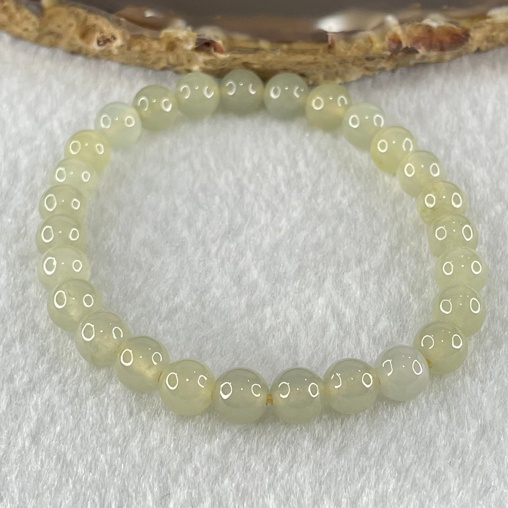 Type A Semi Icy Light Yellowish Blueish Green Jadeite Beads Bracelet 13.73g 14.5cm 6.8mm 27 Beads - Huangs Jadeite and Jewelry Pte Ltd