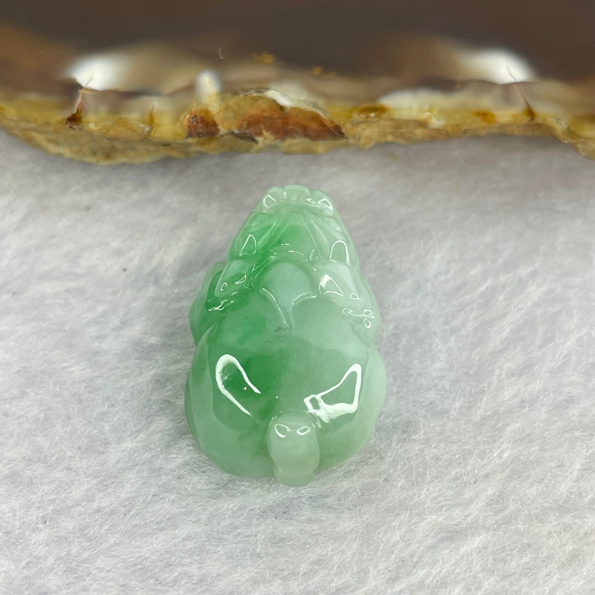 Type A Bright Green with Faint Lavender Jadeite Pixiu Pendent A货辣绿和浅紫罗兰翡翠貔貅吊坠 6.66g 22.7 by 15.6 by 9.6 mm - Huangs Jadeite and Jewelry Pte Ltd