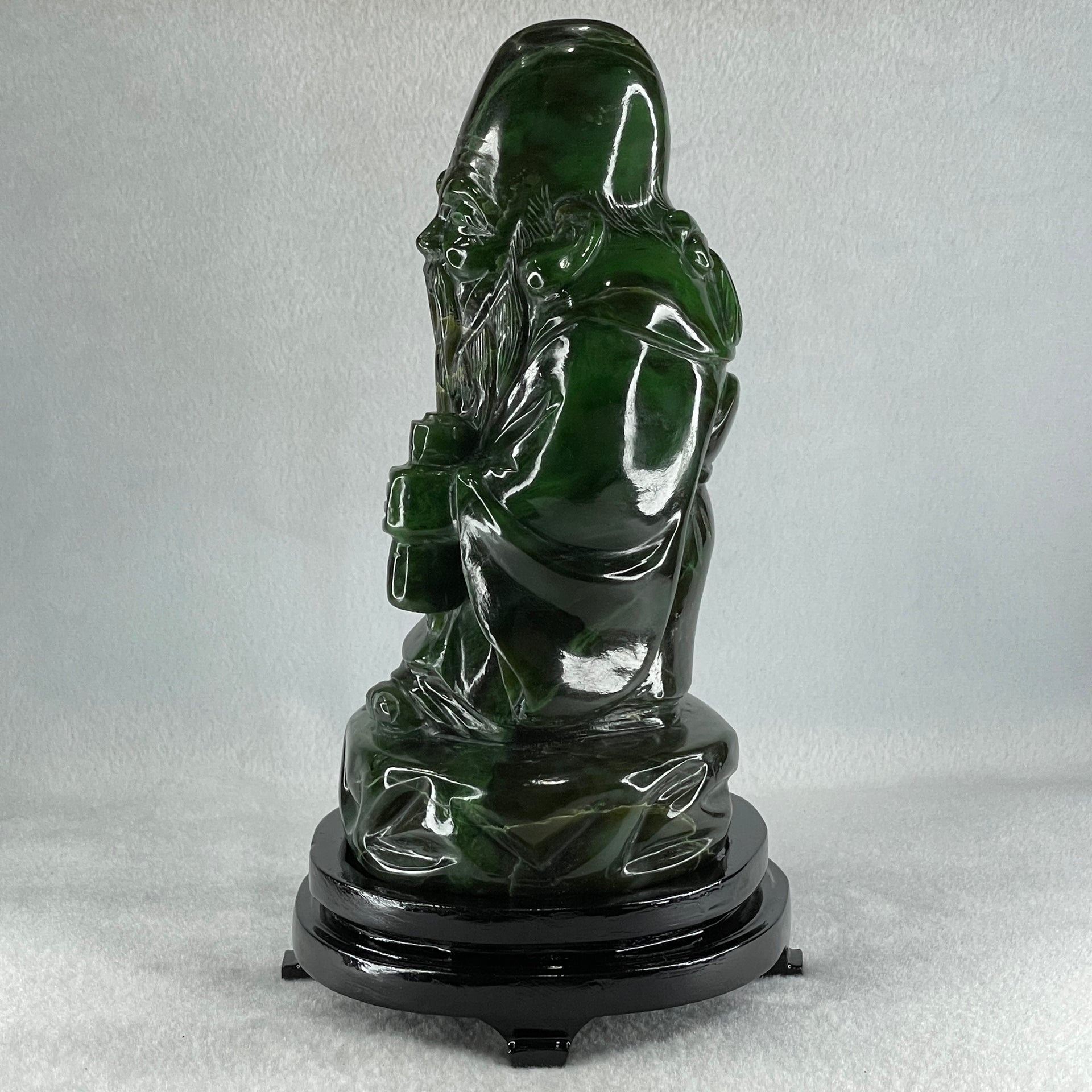 Natural Dark Green Serpentine Shou Xing Gong with Wooden Stand Display 2,374.7g 140.0 by 228.0 by 125.0mm - Huangs Jadeite and Jewelry Pte Ltd