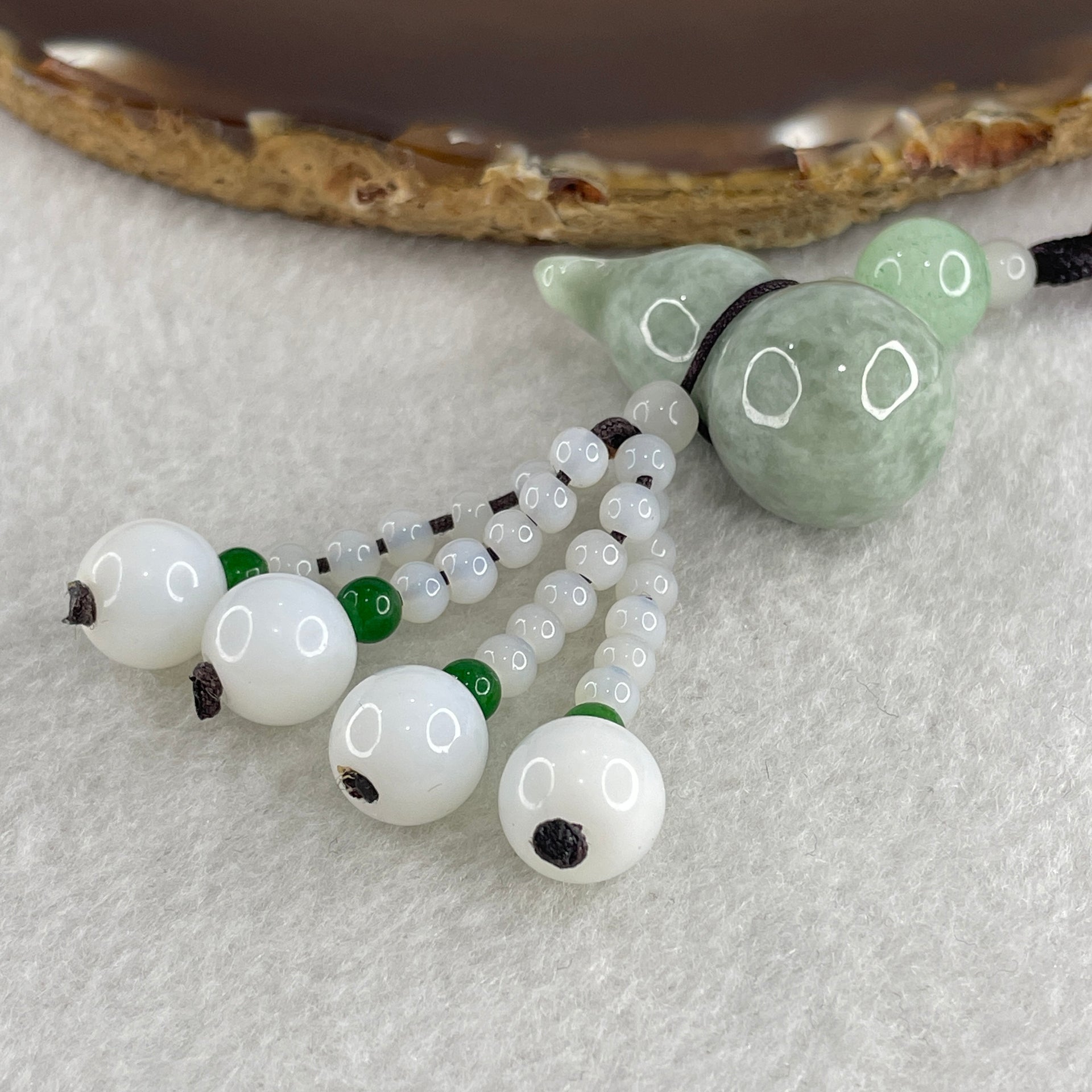 Natural Type A Green Jadeite Hulu Charm 24.96g 33.9 by 17.4mm - Huangs Jadeite and Jewelry Pte Ltd