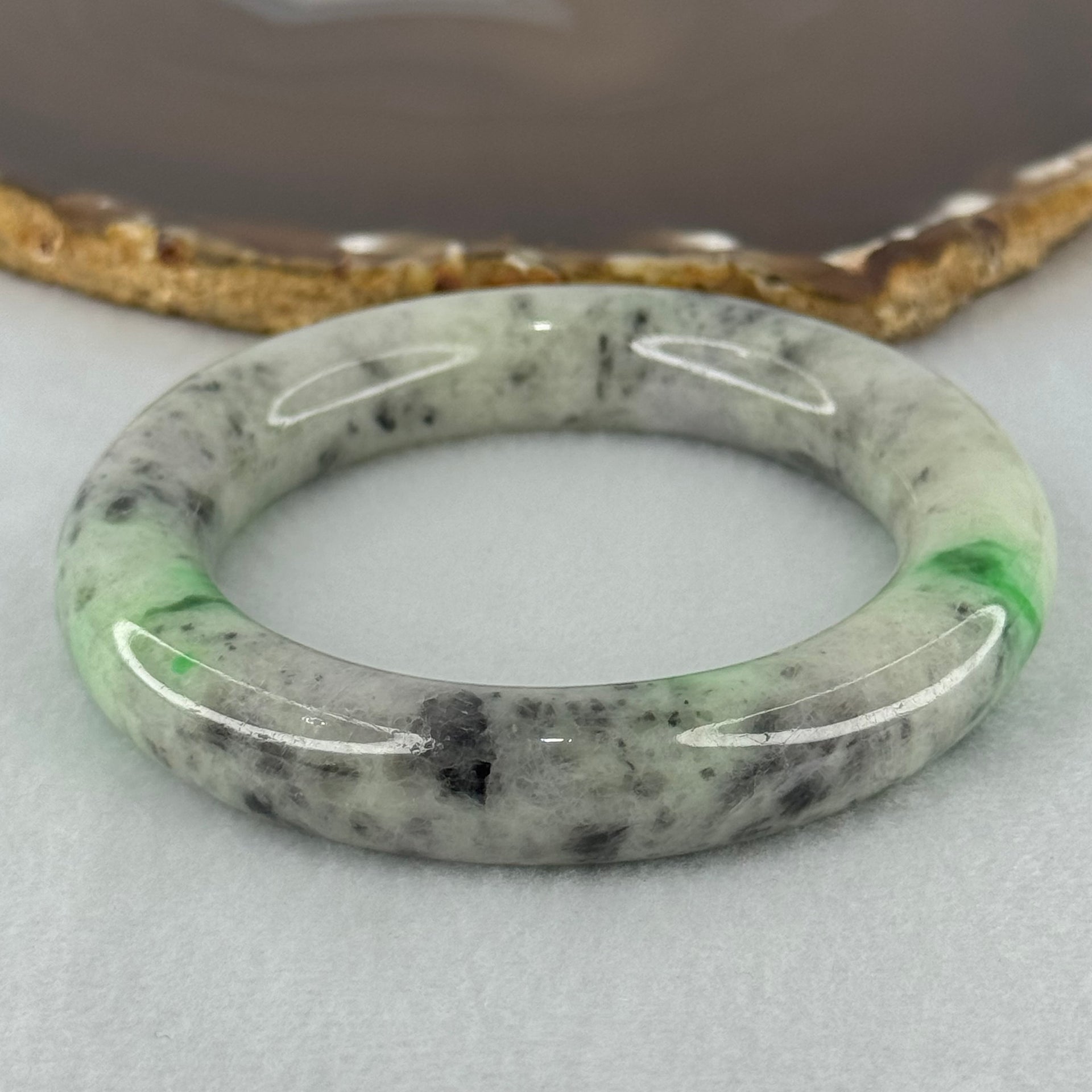 Type A Light Green with Emerald Green and Grey Patches Jadeite Bangle Internal Diameter 55.8mm 93.21g 13.4 by 13.1mm (Very Slight External Rough with Slight Internal Lines) - Huangs Jadeite and Jewelry Pte Ltd