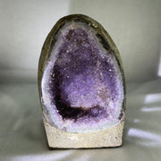 Natural Amethyst Cave with Wooden Stand 1,451.2g 116.4 by 93.7 by 190.0mm - Huangs Jadeite and Jewelry Pte Ltd