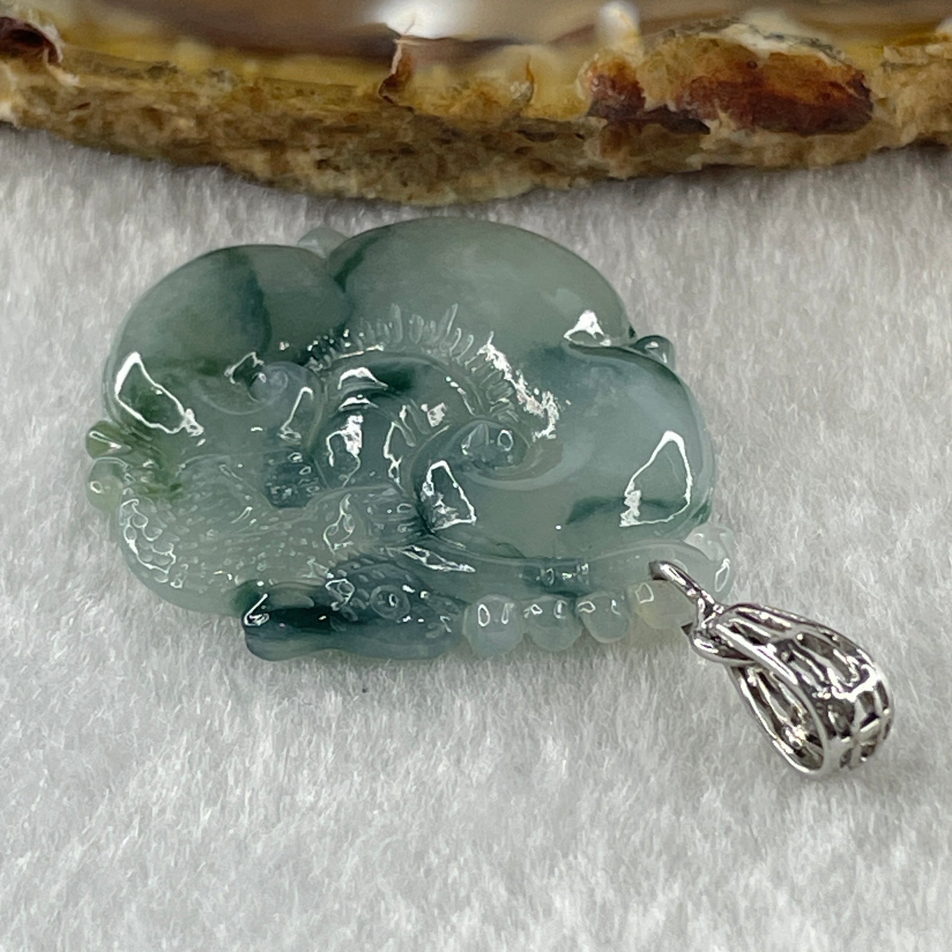 Type A Natural Semi Icy Blueish Green with Piao Hua Flora Jadeite Ruyi in S925 Silver Pendant 6.48g 32.2 by 21.4 by 5.1mm - Huangs Jadeite and Jewelry Pte Ltd