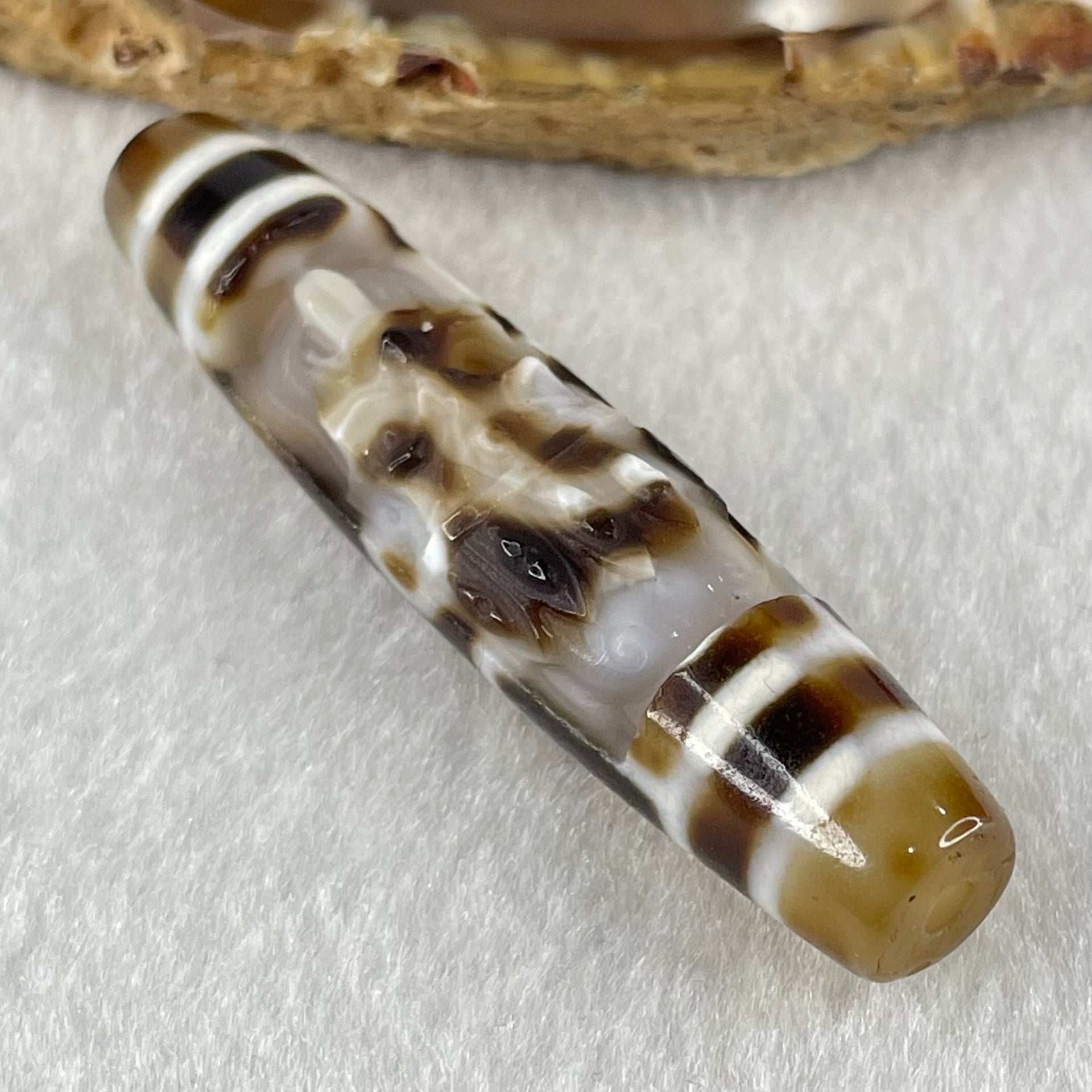 Natural Powerful Tibetan Old Oily Agate Zha Ji La Mu Female Cai Shen Carvings on 9 Eyes Dzi Bead Heavenly Master (Tian Zhu) 九眼扎基拉姆女财神天珠 13.88g 57.4 by 13.3mm - Huangs Jadeite and Jewelry Pte Ltd