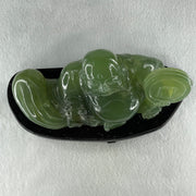 Natural Green Serpentine Siting Milo Buddha with Coin with Wooden Stand Display 1014.8g 200.0 by 100.0 by 105.0mm - Huangs Jadeite and Jewelry Pte Ltd