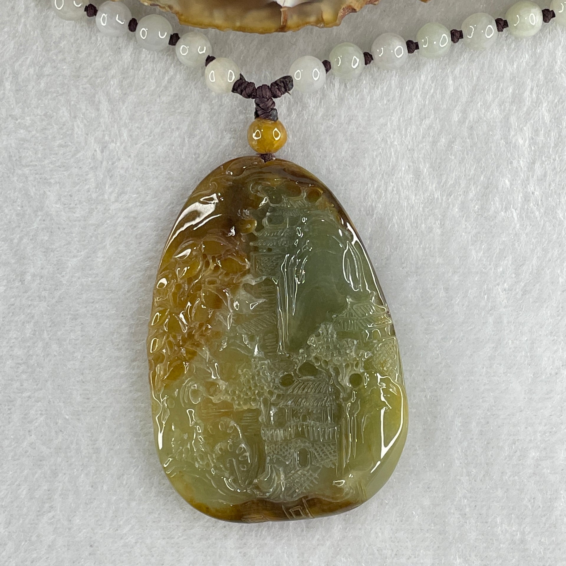 Grand Master Type A Green with Brownish Jadeite Shan Shui with Gui Ren Double Side Pendant 52.28g 55.3 by 38.2 by 7.3mm - Huangs Jadeite and Jewelry Pte Ltd