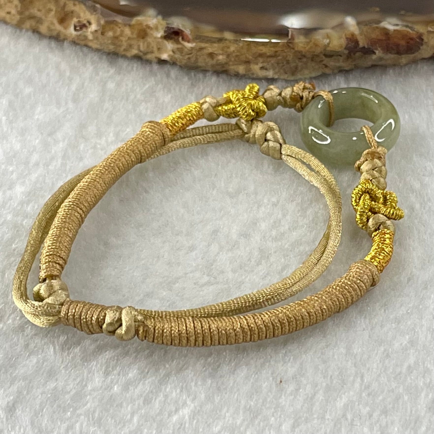 Type A Blueish Green with Brown Jadeite Ping An Kou String Bracelet 2.98g 15.2 by 5.7mm - Huangs Jadeite and Jewelry Pte Ltd