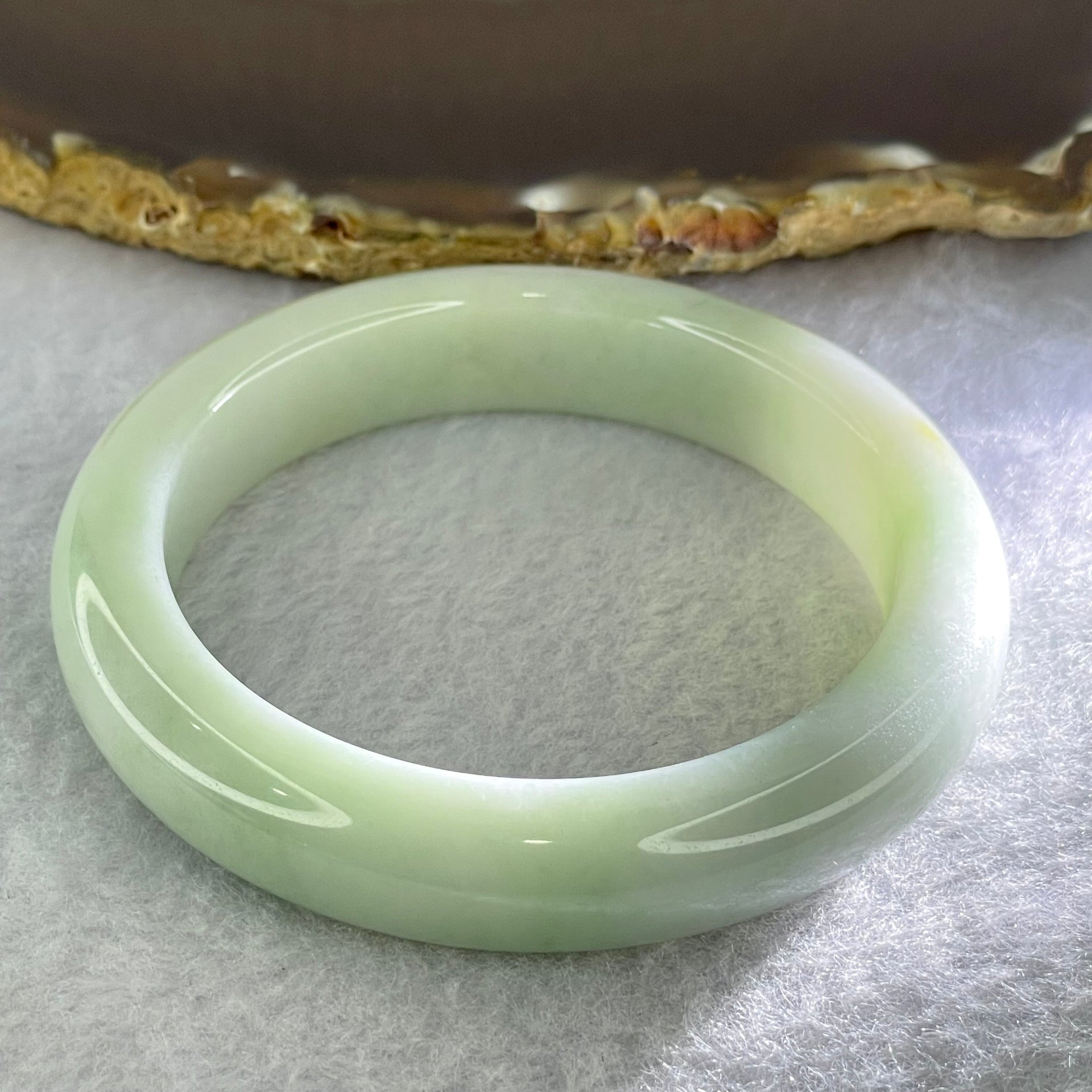 Type A Light Green Jadeite Bangle Internal Diameter 55.5mm 62.19g 12.8 by 8.9mm (External Rough) - Huangs Jadeite and Jewelry Pte Ltd