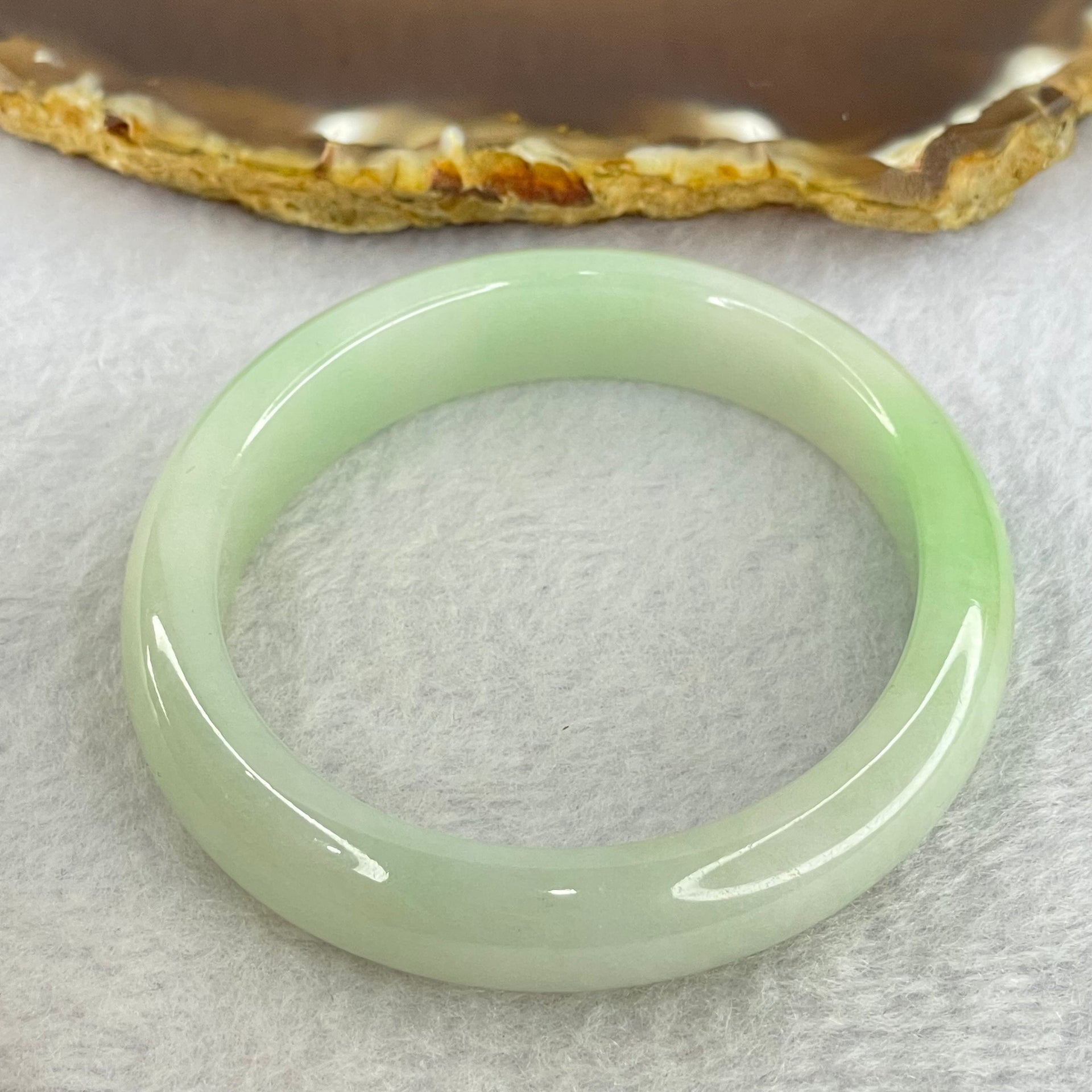 Type A Light Green Jadeite Oval Bangle Internal Diameter 56.2mm 40.54g 11.1 by 7.2mm (Slight Internal Line) - Huangs Jadeite and Jewelry Pte Ltd