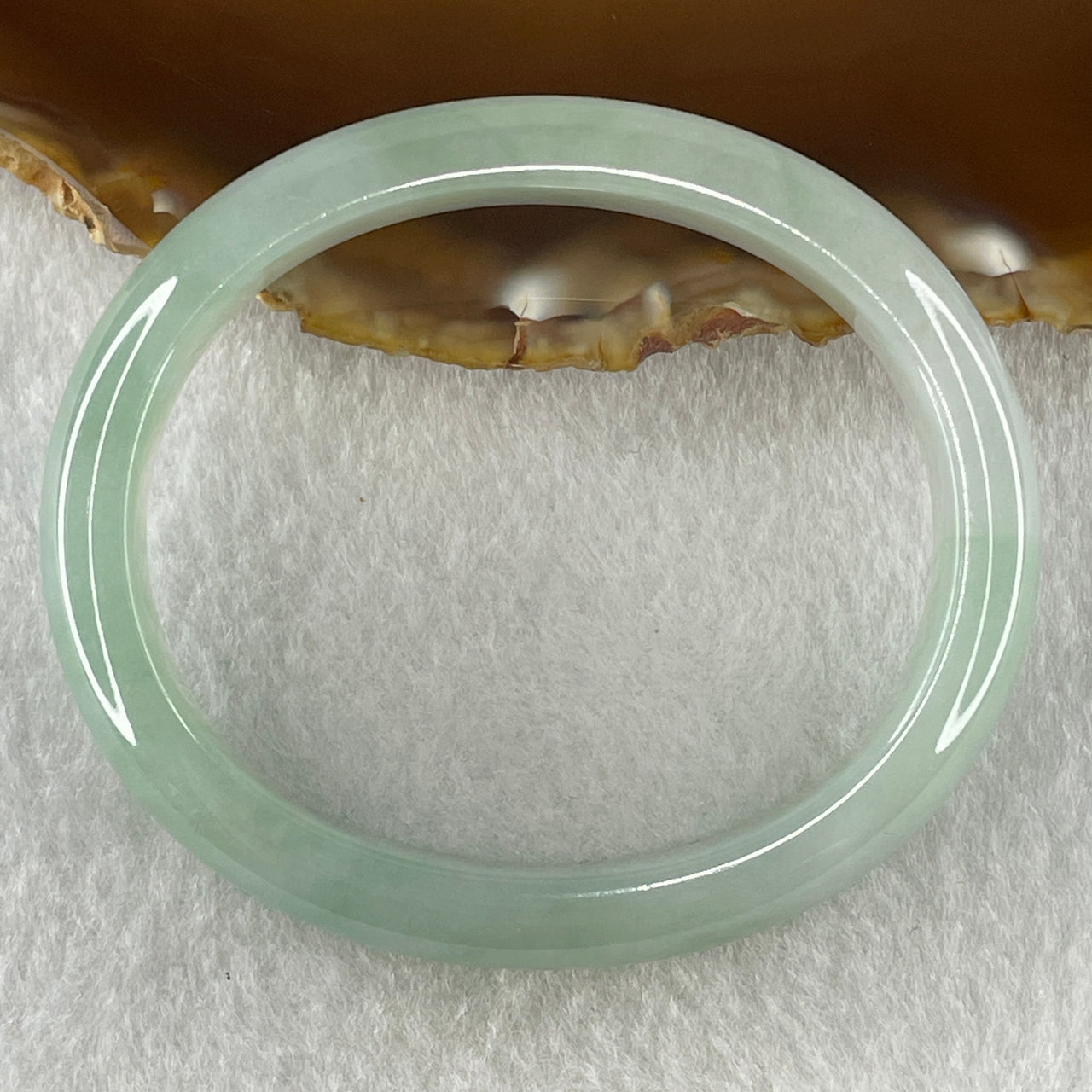 Natural Type A Jelly Full Light Green Jadeite Oval Bangle 34.07g Inner Diameter 53.8mm 10.2 by 7.4mm (Very Slight Internal Lines) - Huangs Jadeite and Jewelry Pte Ltd