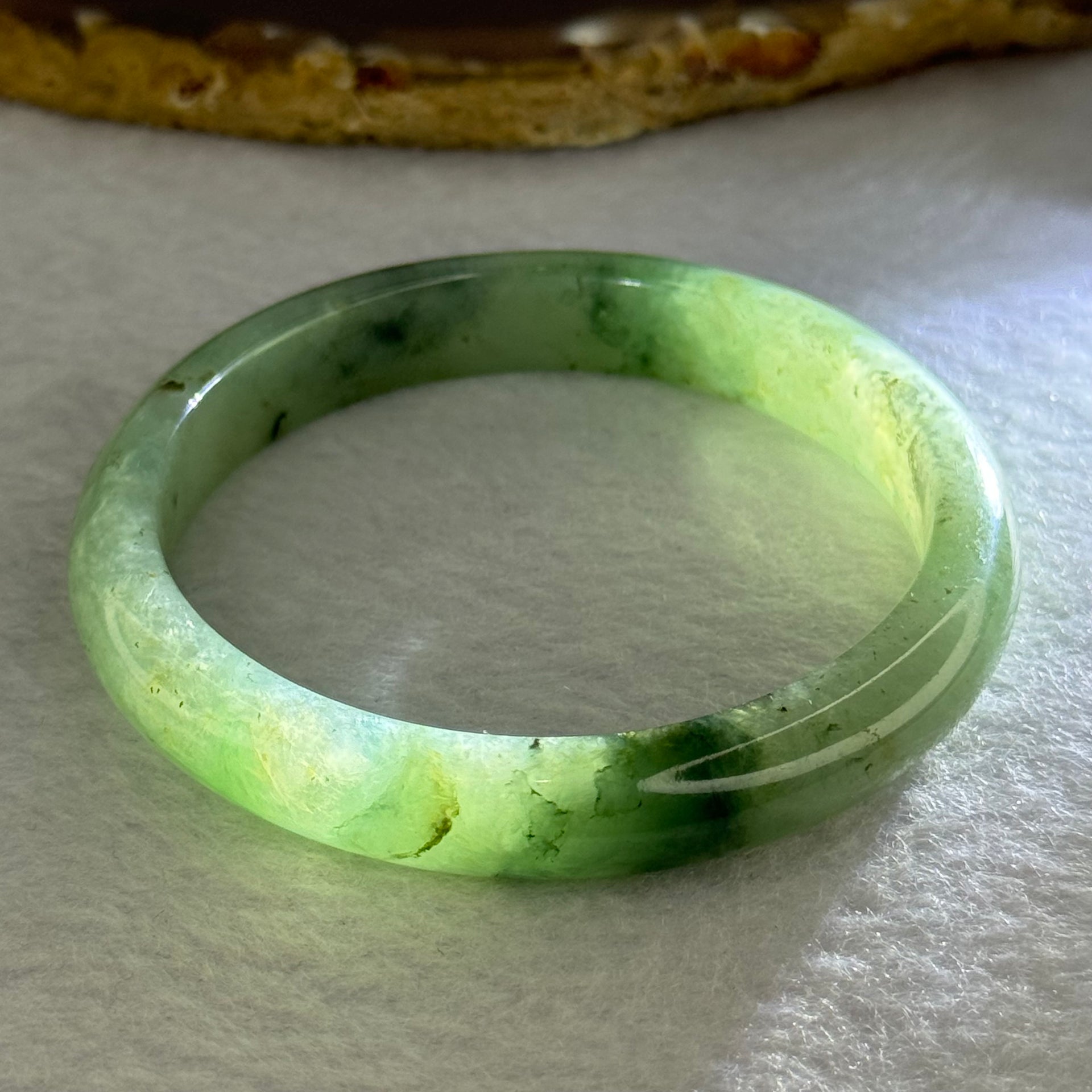 Type A Green Piao Hua Jadeite Bangle Internal Diameter 54.3mm 35.82g 9.9 by 7.5mm (Slight External Line) - Huangs Jadeite and Jewelry Pte Ltd