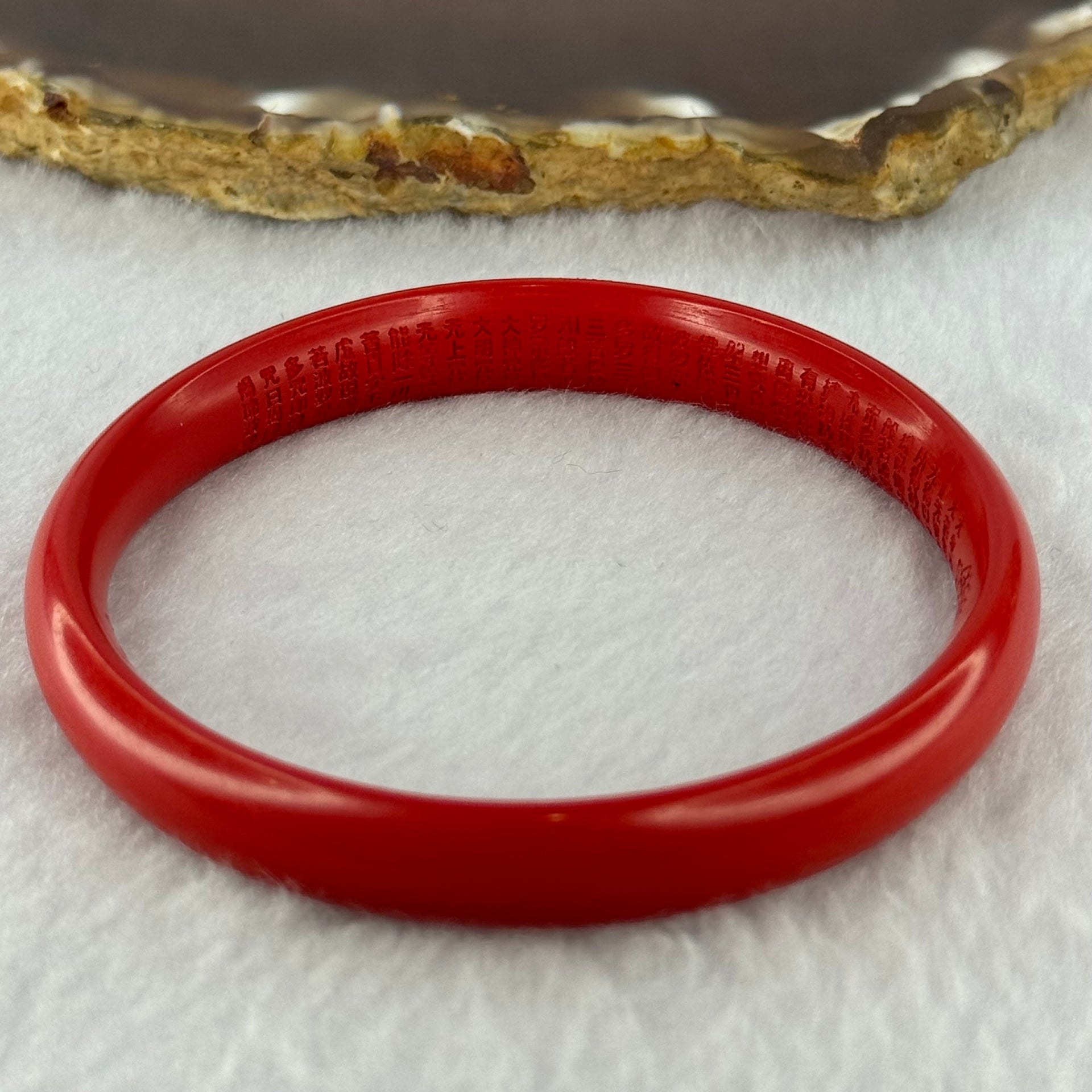 Natural Red Cinnabar Bangle with Inscription 20.10g Internal Diameter 58.0mm 10.0 by 5.9mm - Huangs Jadeite and Jewelry Pte Ltd